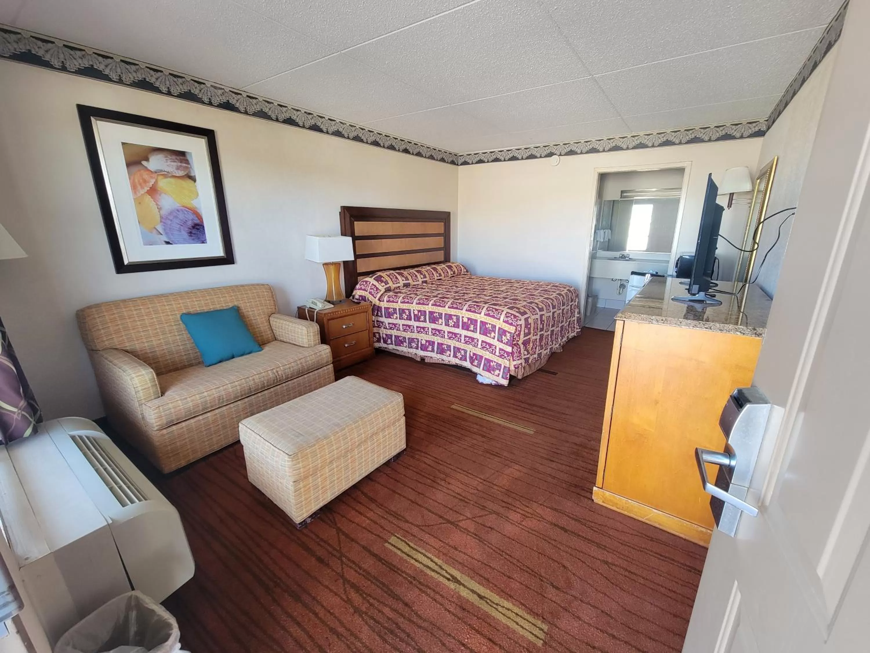 Bed in Studio 9 Inn & Suites