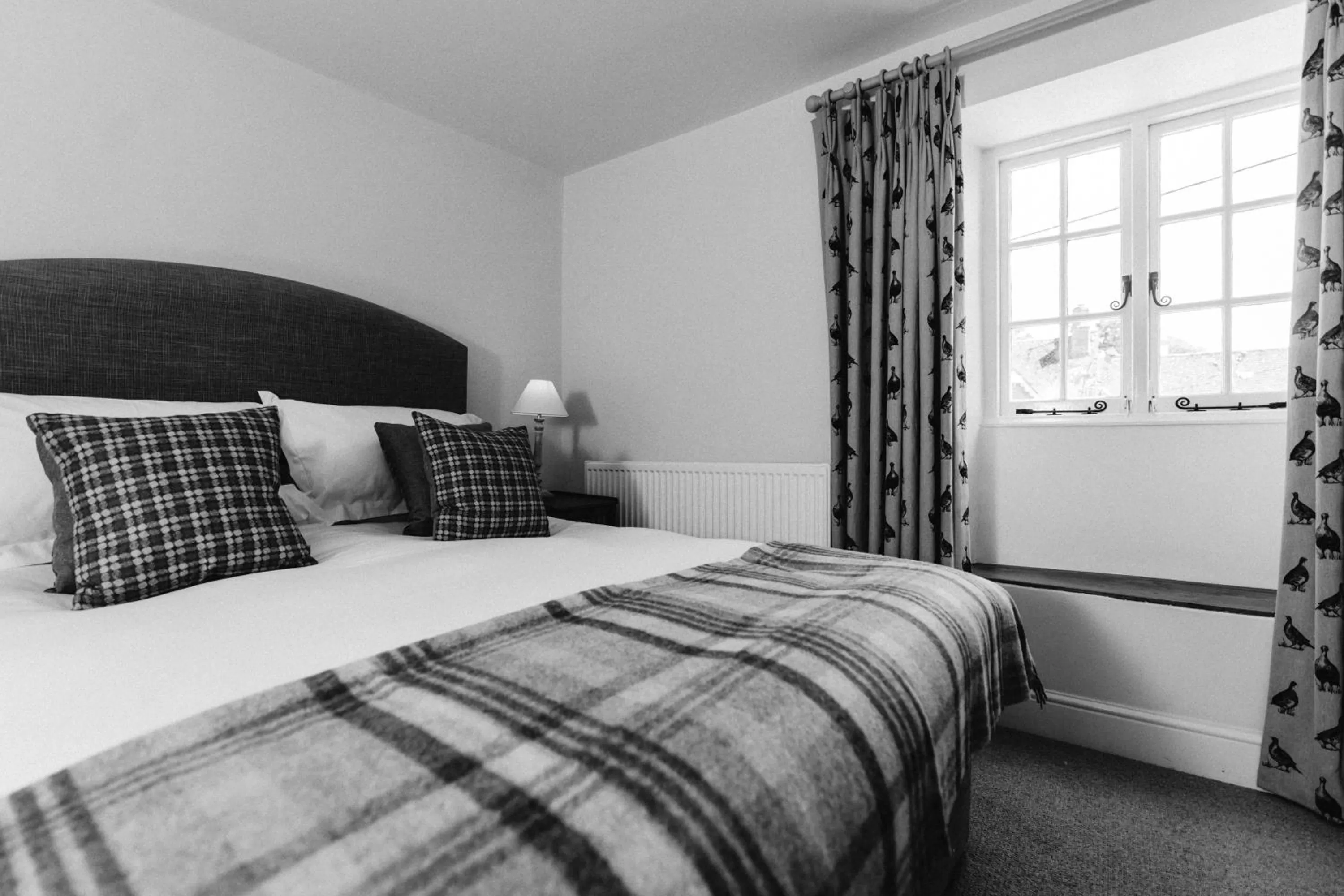 Bed in Cat and Custard Pot Inn