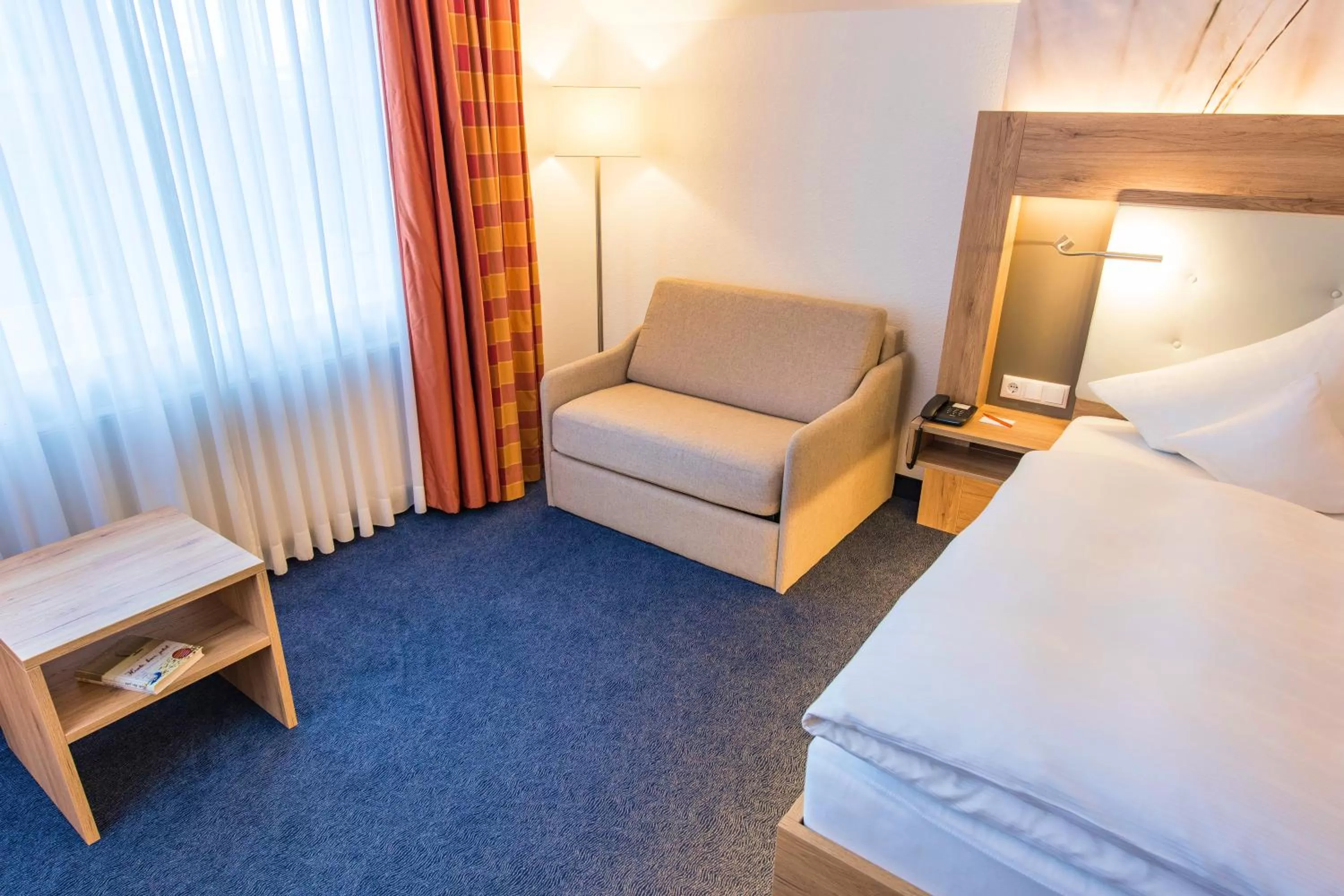 Photo of the whole room, Bed in IDINGSHOF Hotel & Restaurant