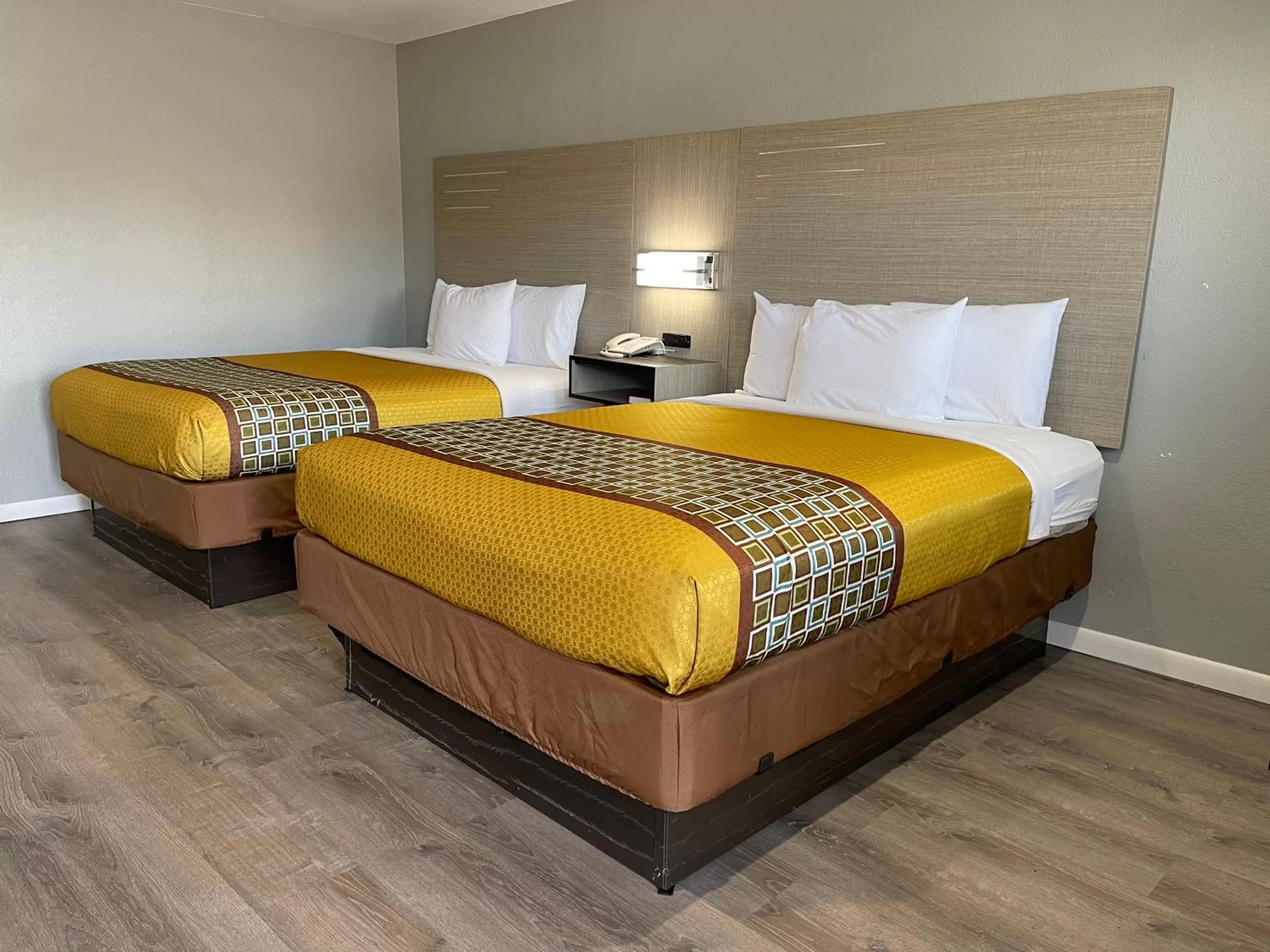 Bed in Copper Manor Motel