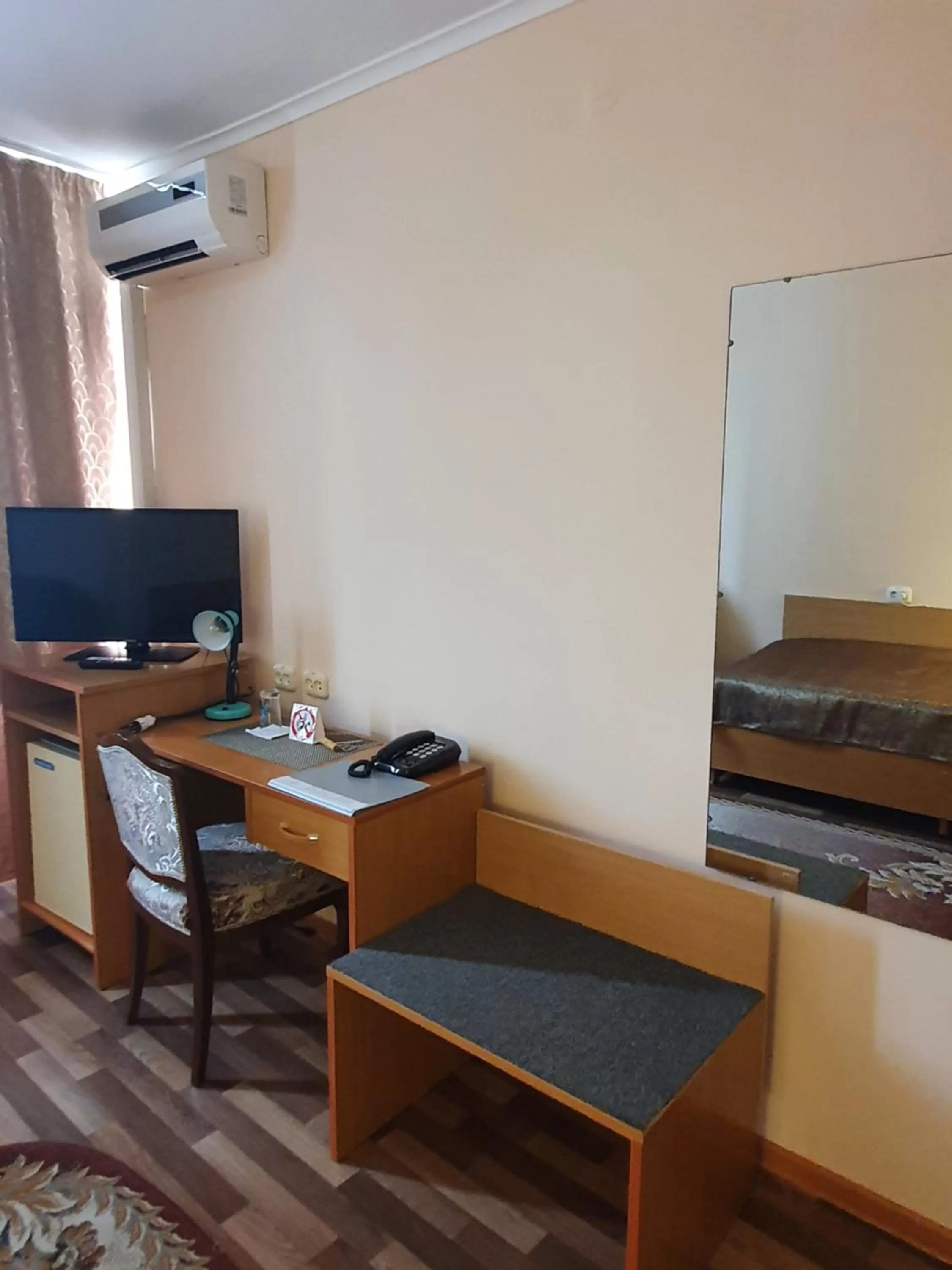 Seating area, TV/Entertainment Center in Aktobe Hotel