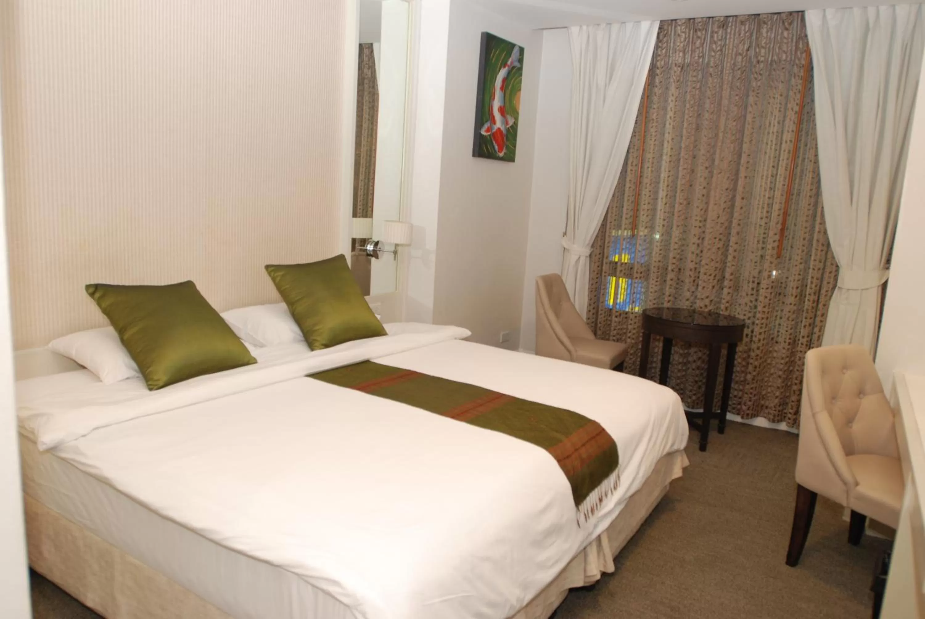 Photo of the whole room, Bed in Aphrodite Inn Bangkok