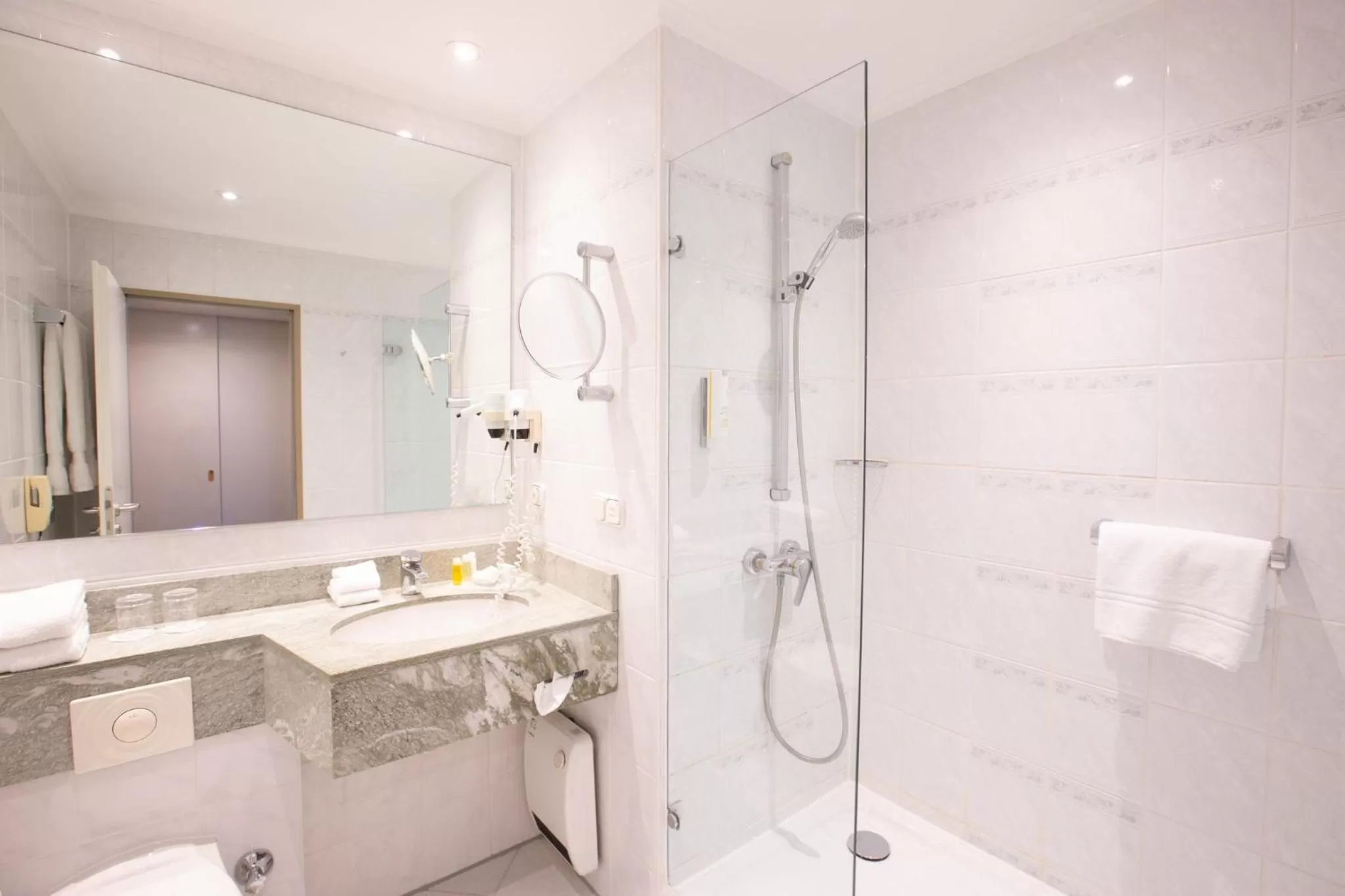 Bathroom in Crowne Plaza Frankfurt Congress Hotel by IHG