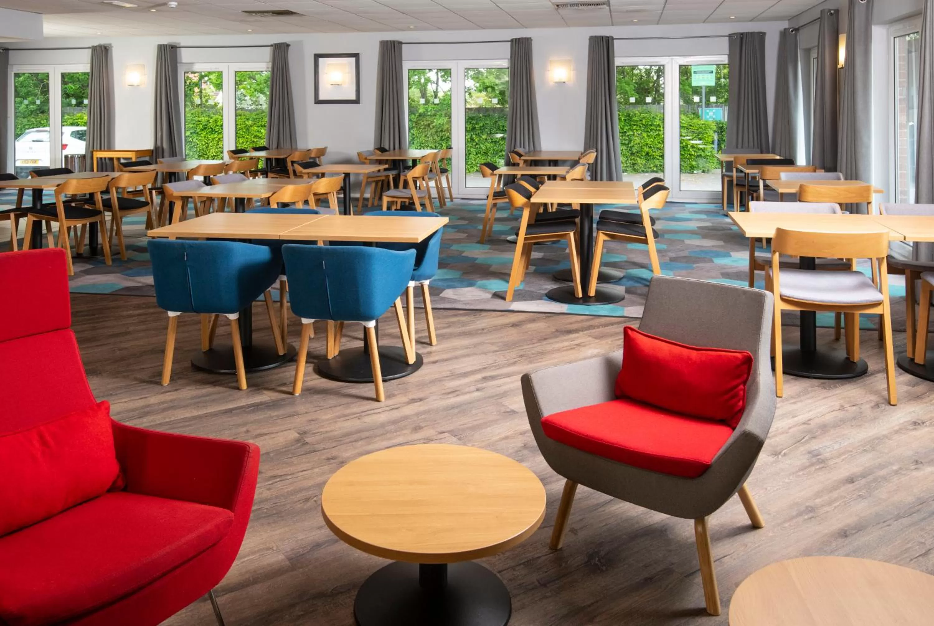 Dining area in Holiday Inn Express Peterborough by IHG