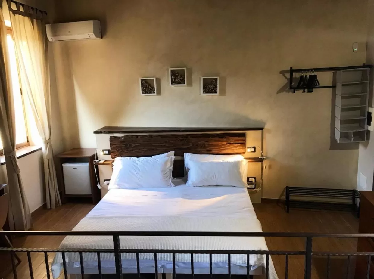 Bed in LA PERGOLA - Affitta Camere