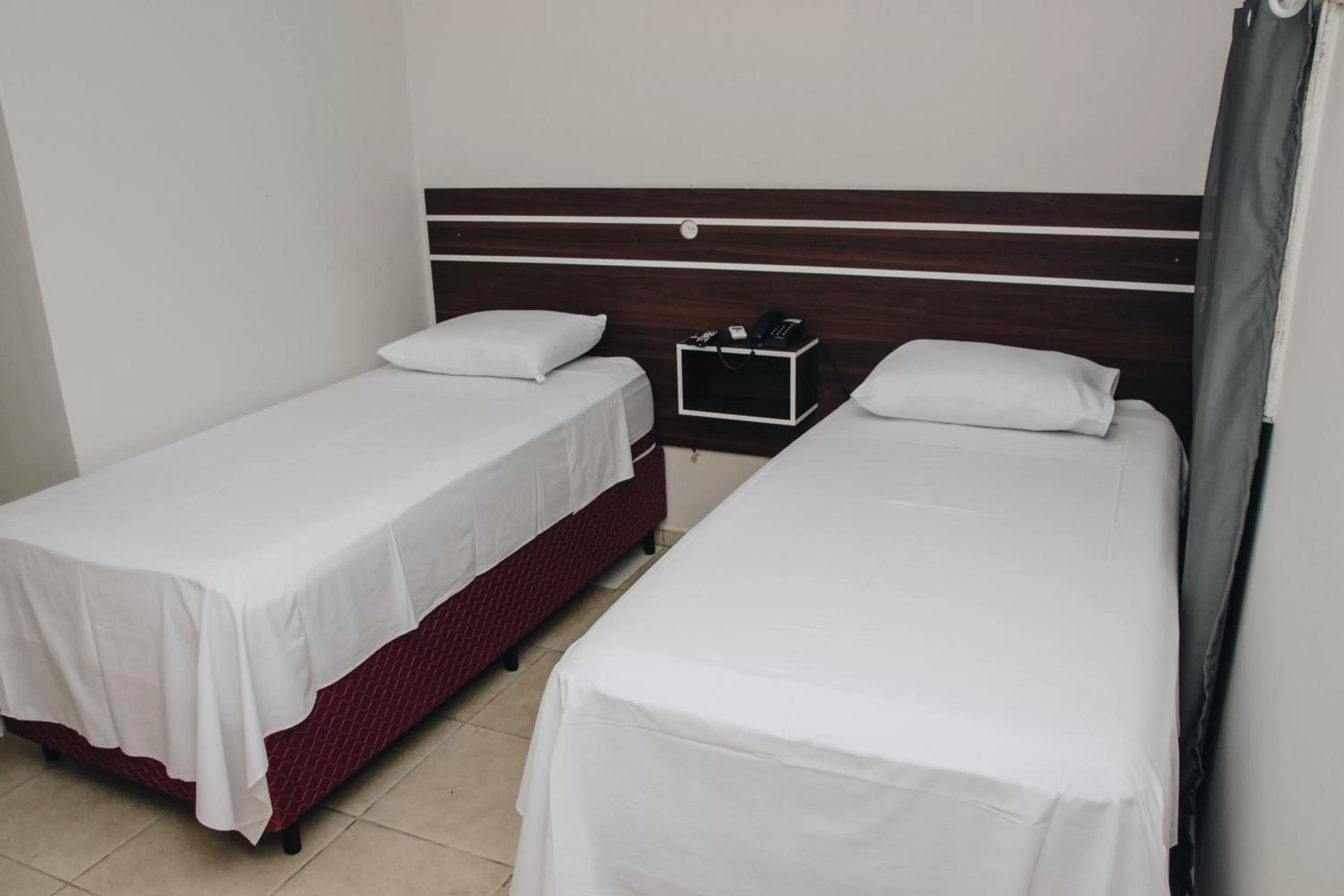 Bed in SAMIR HOTEL COMFORT