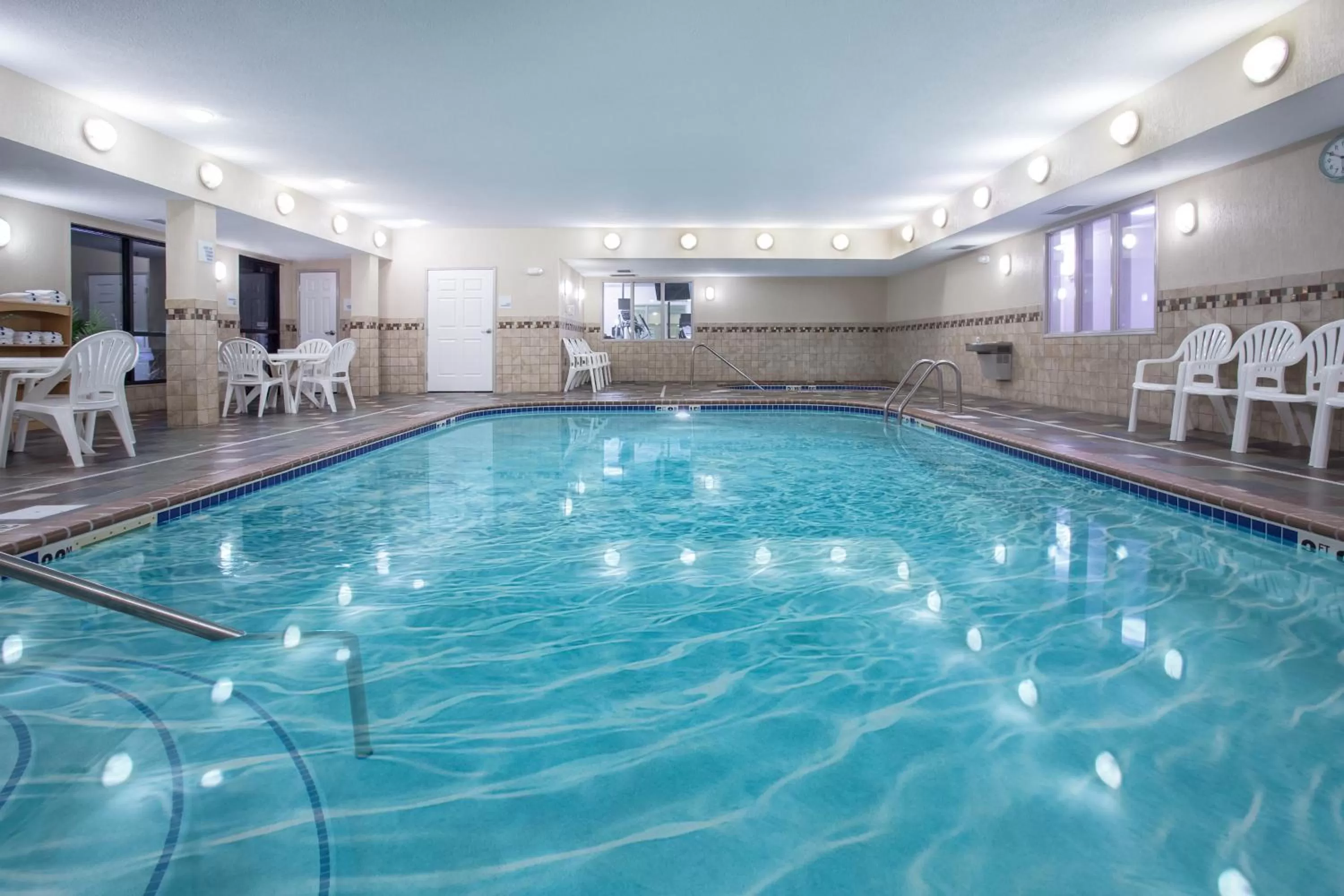 Swimming pool in Holiday Inn Express Hotel & Suites Fort Collins by IHG