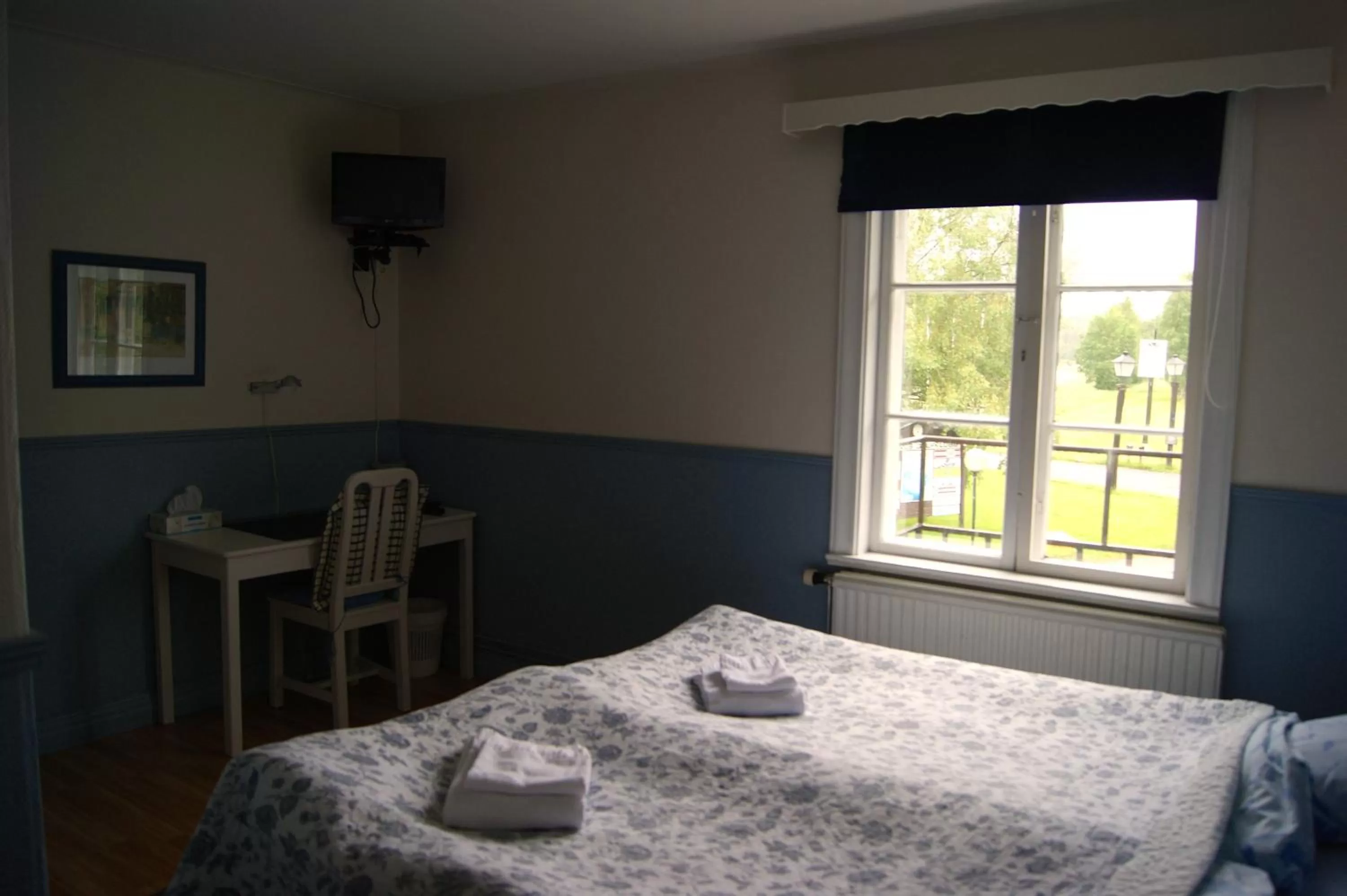 Photo of the whole room, Bed in Värdshuset Lugnet