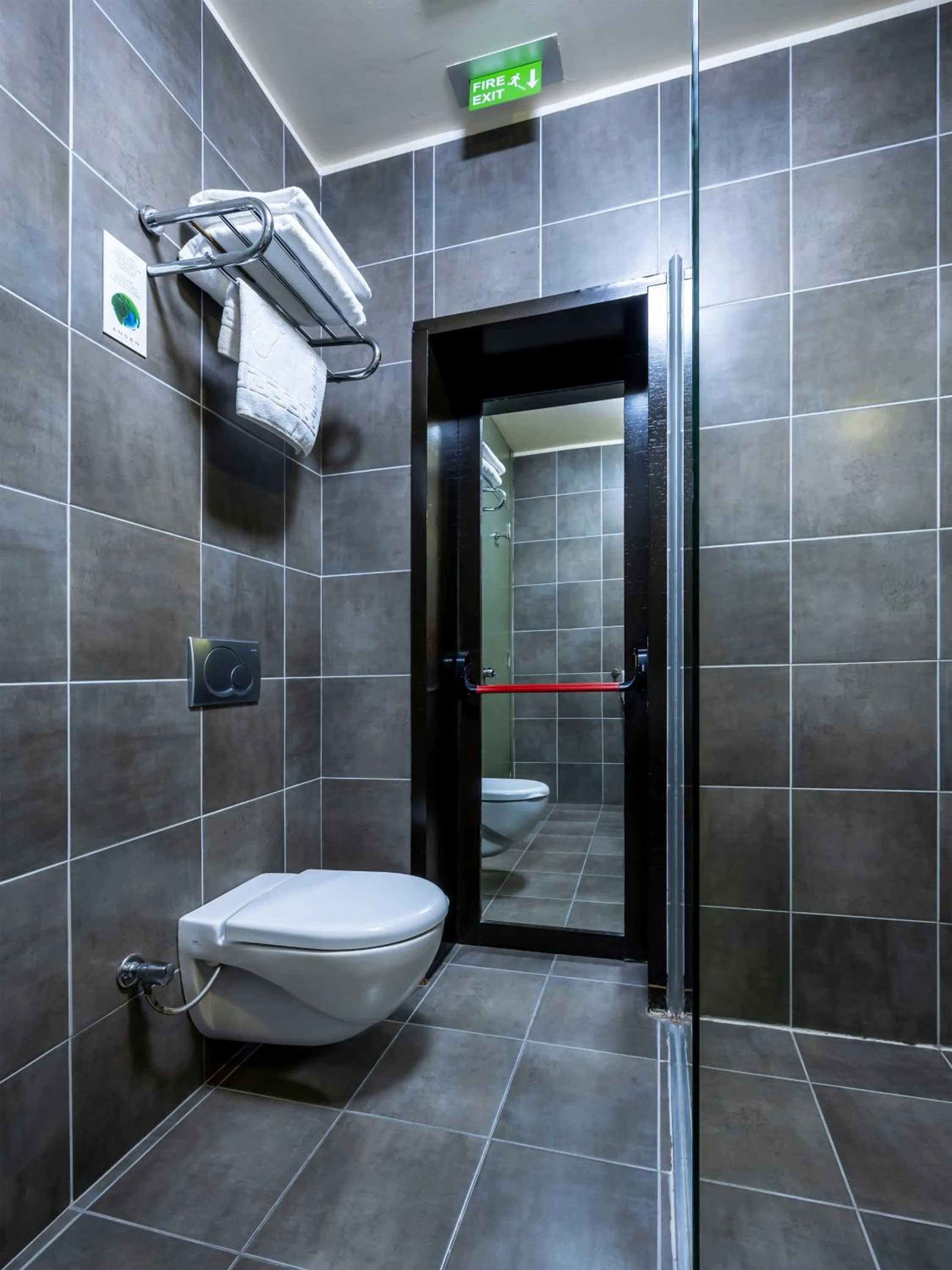 Toilet in Ansen Hotel and Suites