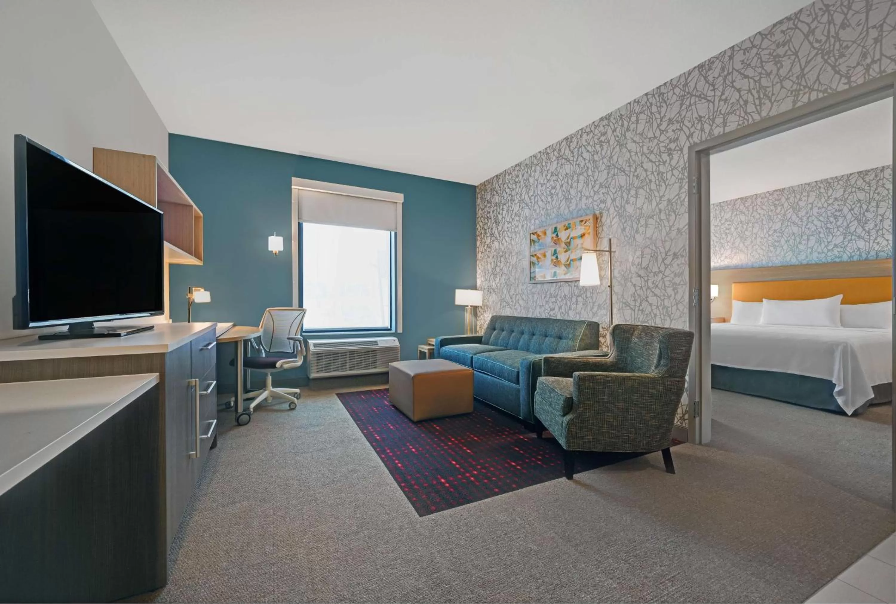 Living room, Bed in Home2 Suites By Hilton Tracy, Ca