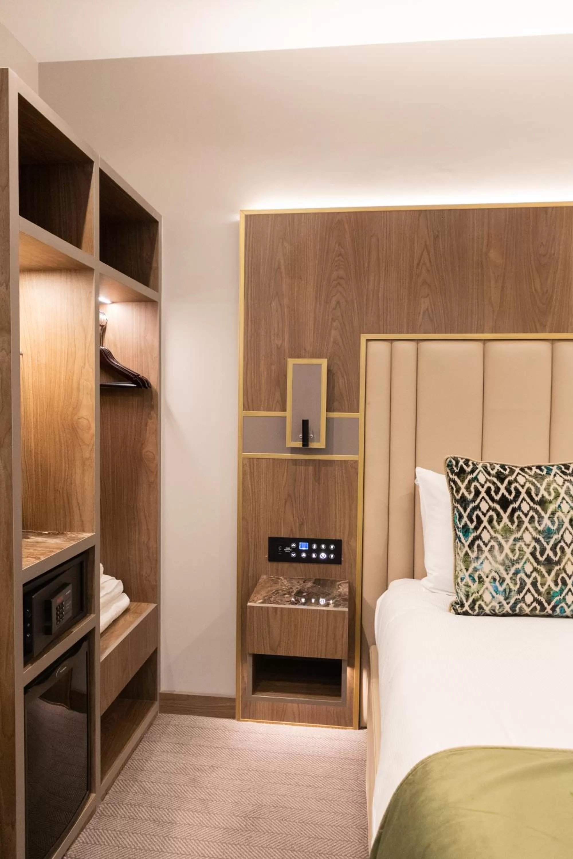 Bed in Merit Kensington Hotel