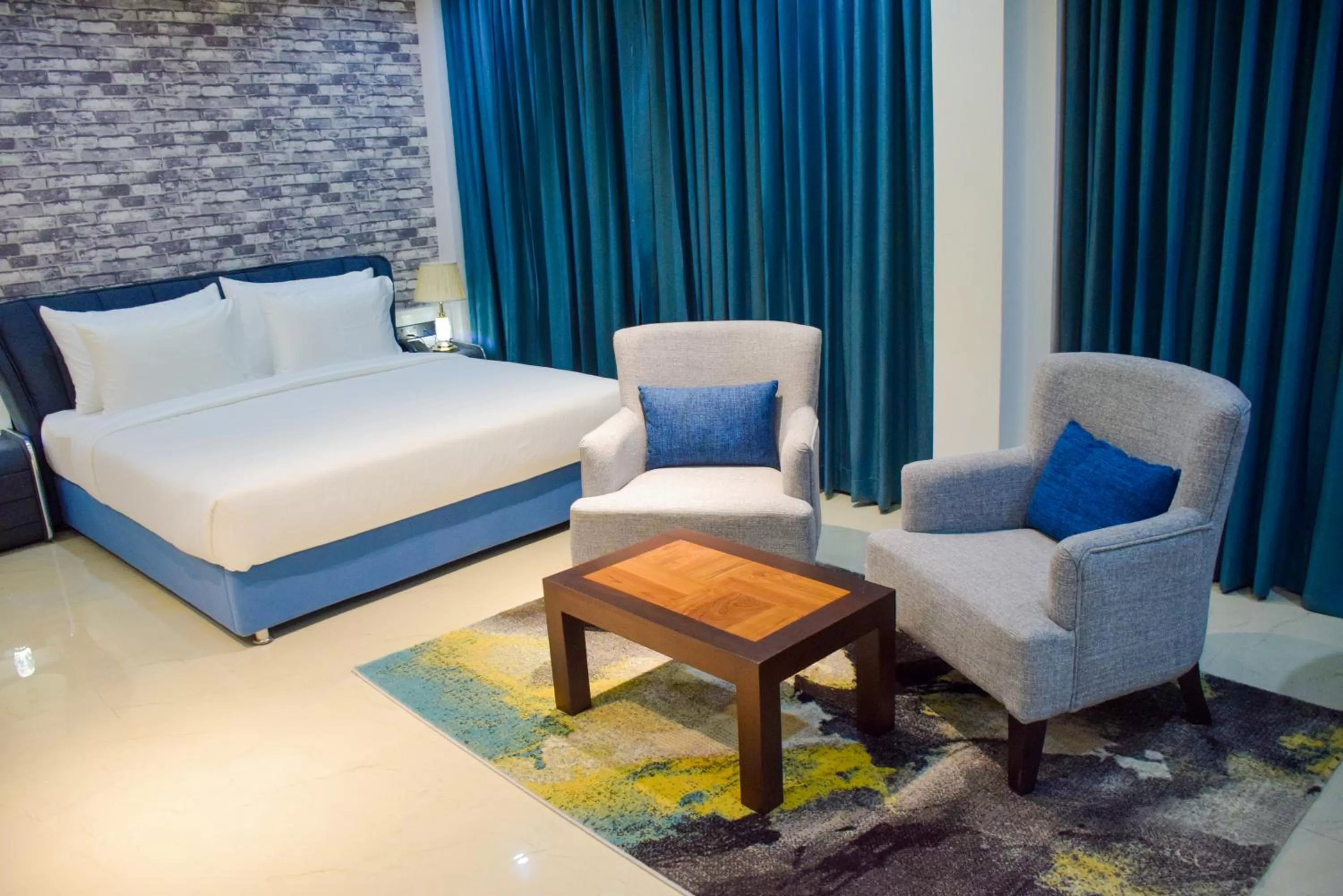 Living room, Bed in Ruvisha Beach Hotel