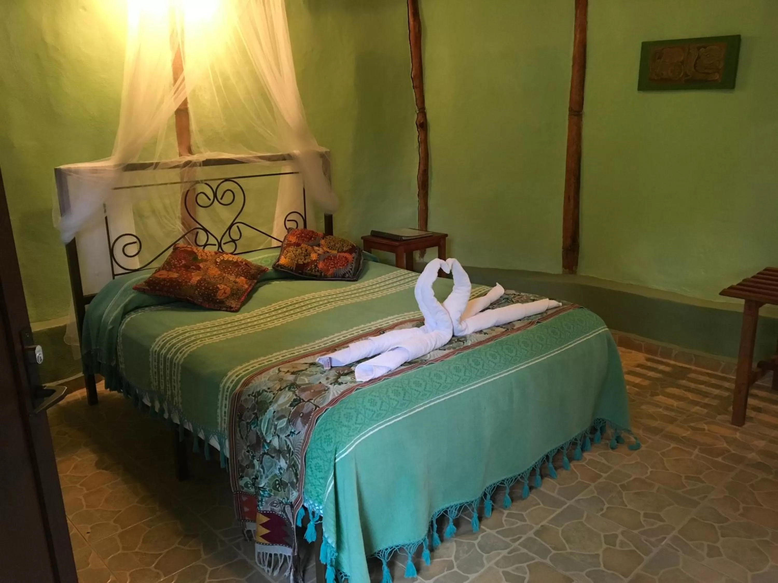 Bed in The Pickled Onion Eco-Boutique B&B