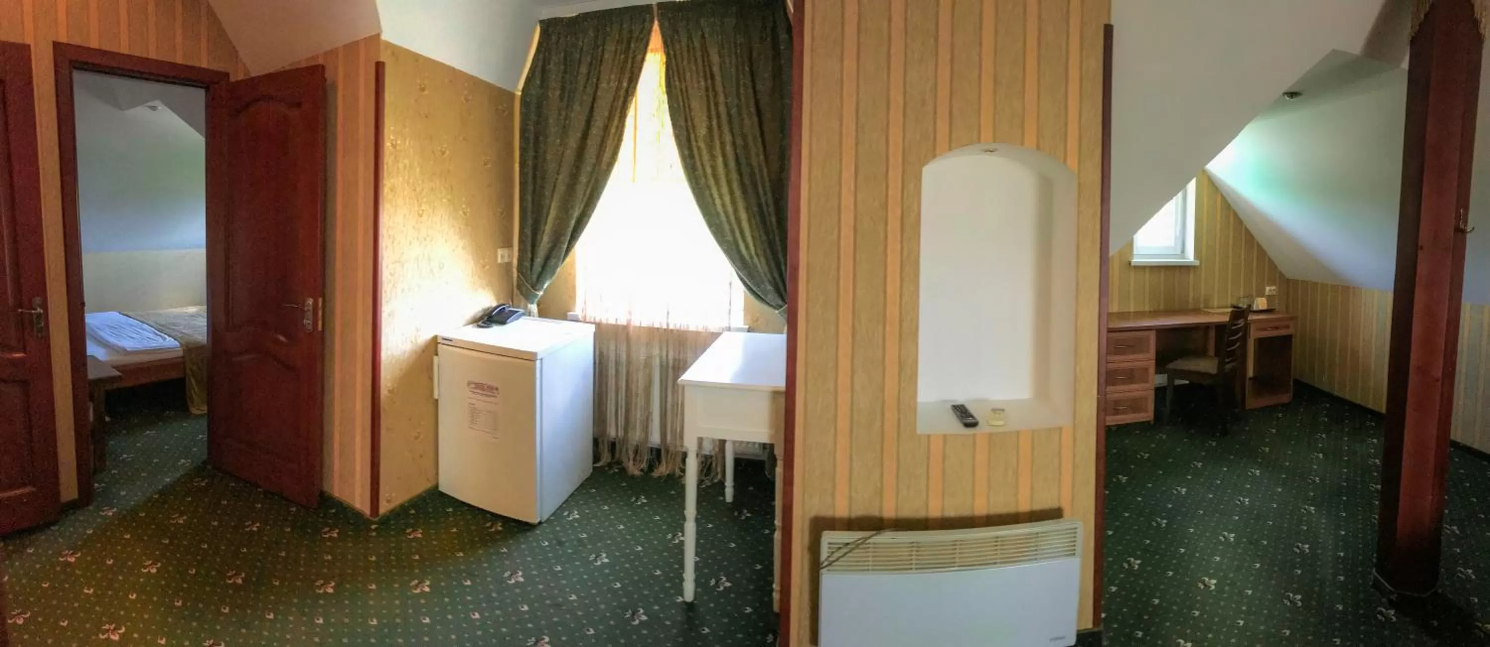 Seating area, Bed in Pivdenna Brama