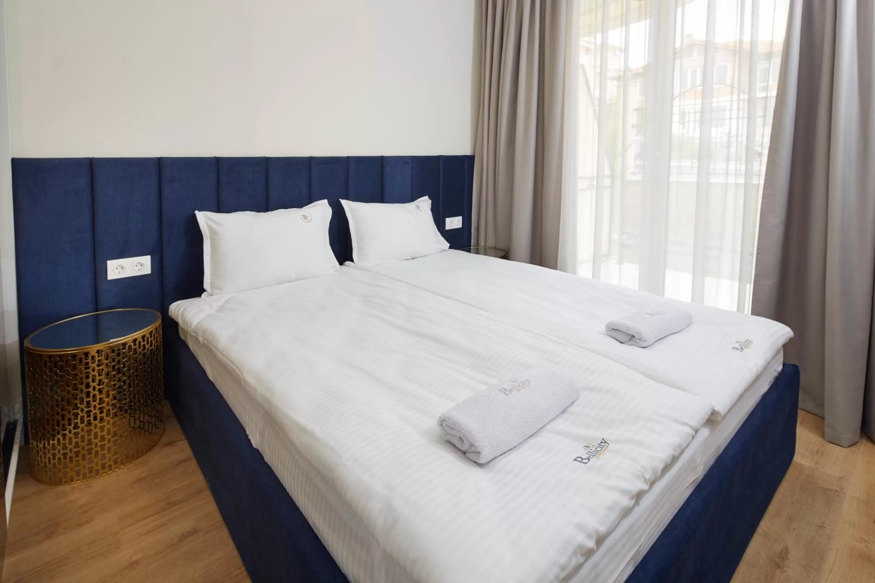 Photo of the whole room, Bed in Bellicity Apart Complex