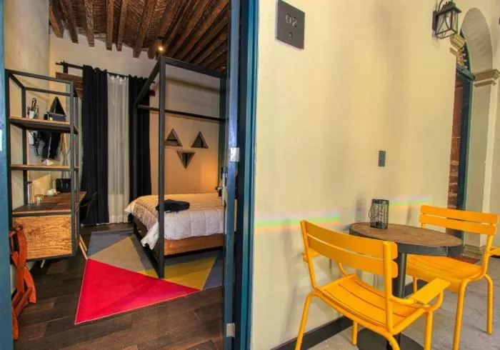 Bed in Antigua Trece Hotel Fusión & SPA