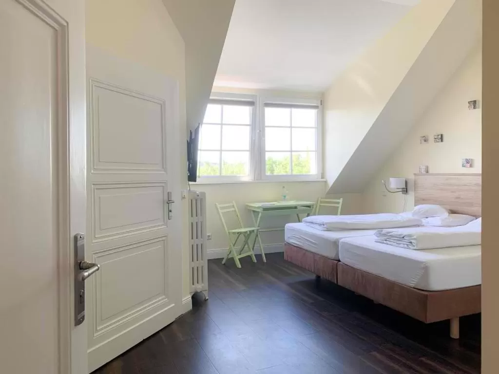 Bed in 2T Hotel artgenossen