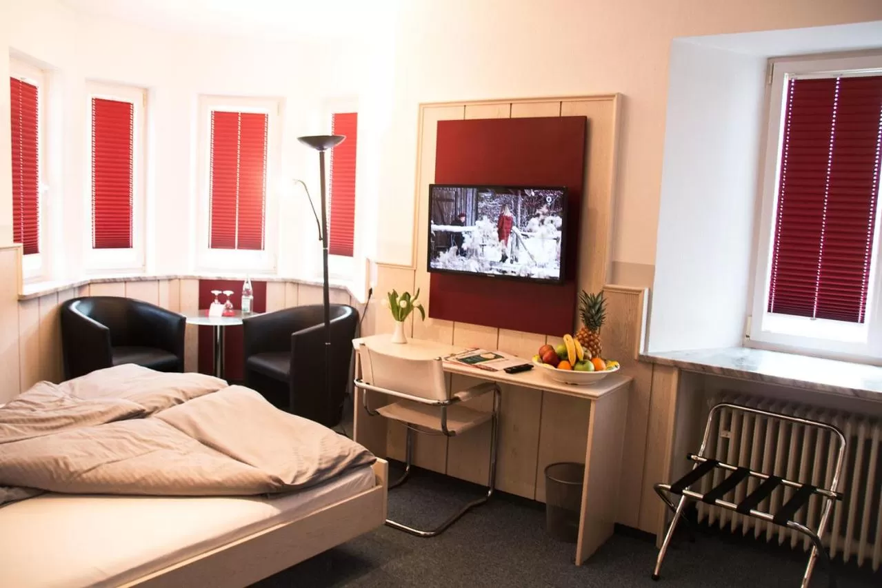 Photo of the whole room, Bed in Landhotel Weißer Hahn