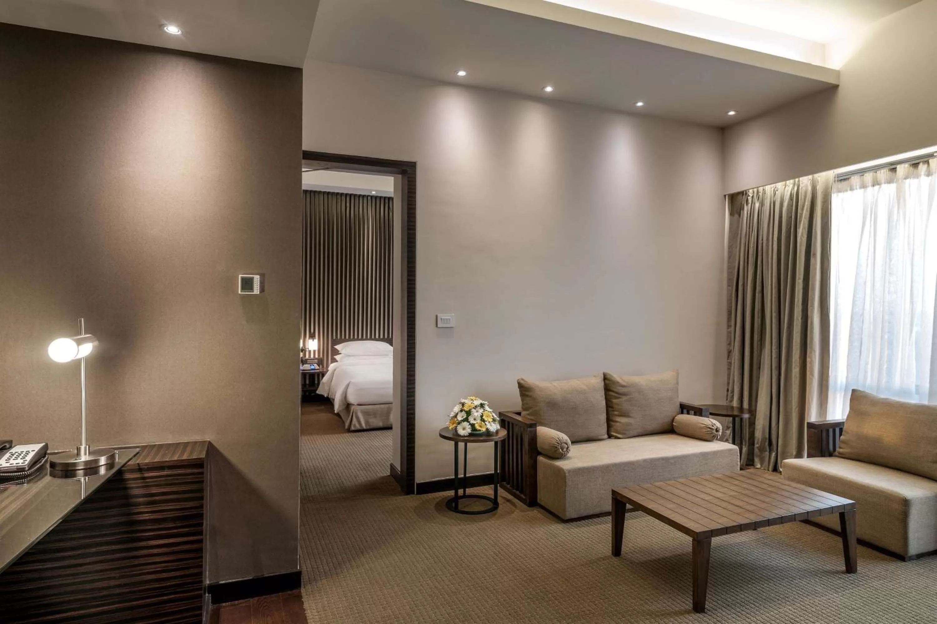 Photo of the whole room, Bed in Hyatt Raipur