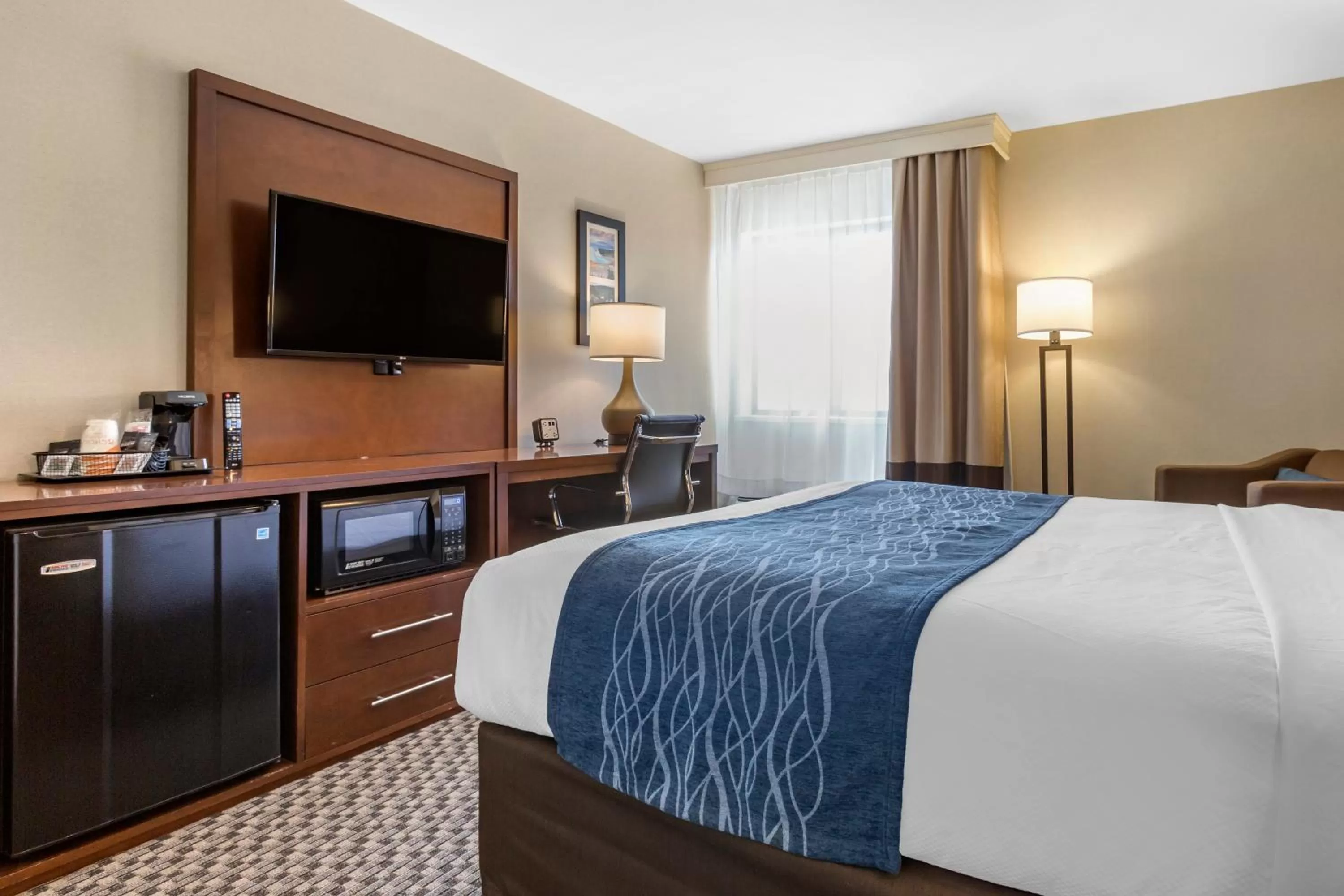 Bed in Comfort Inn at Buffalo Bill Village Resort