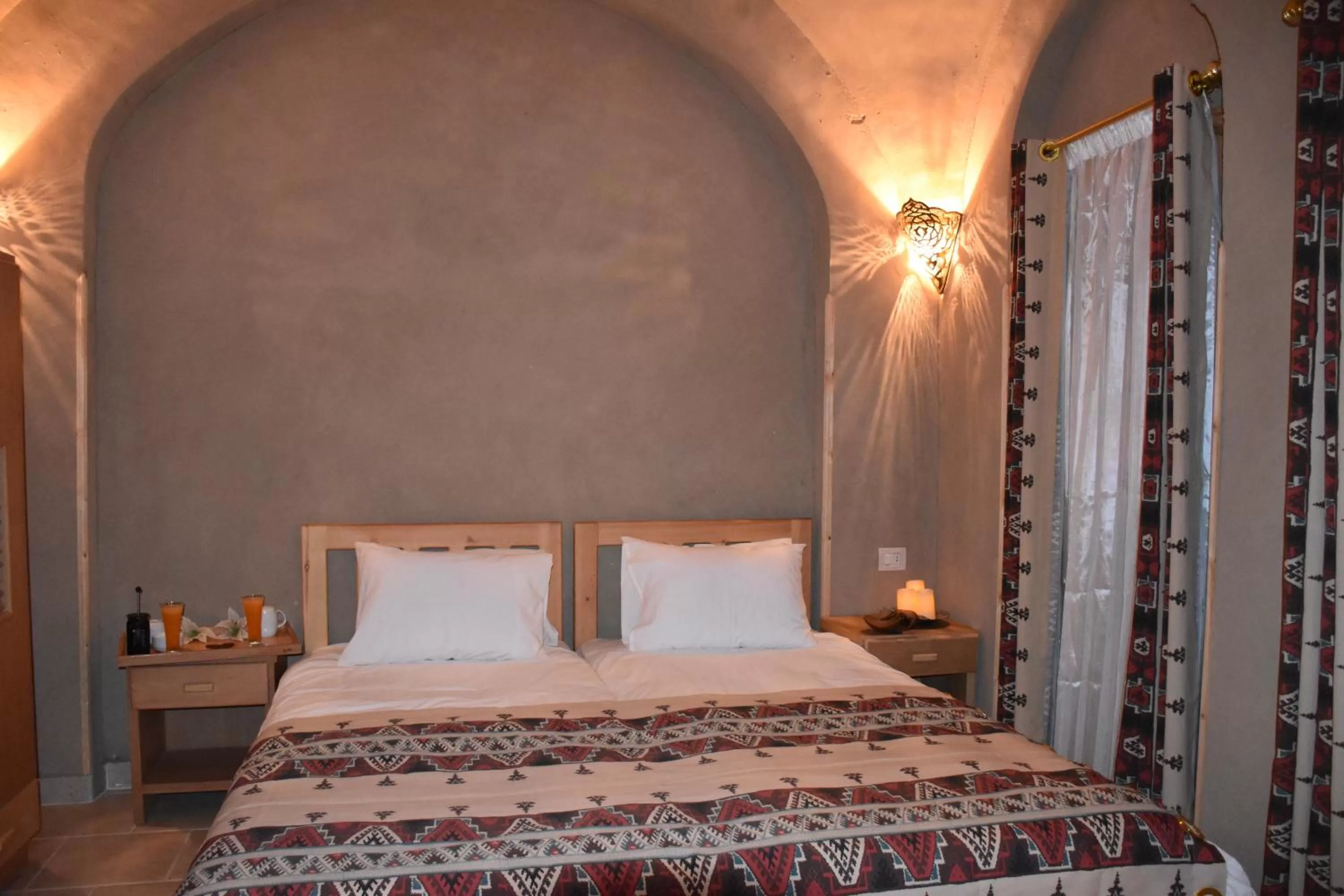 Bed in Embrace Hotel