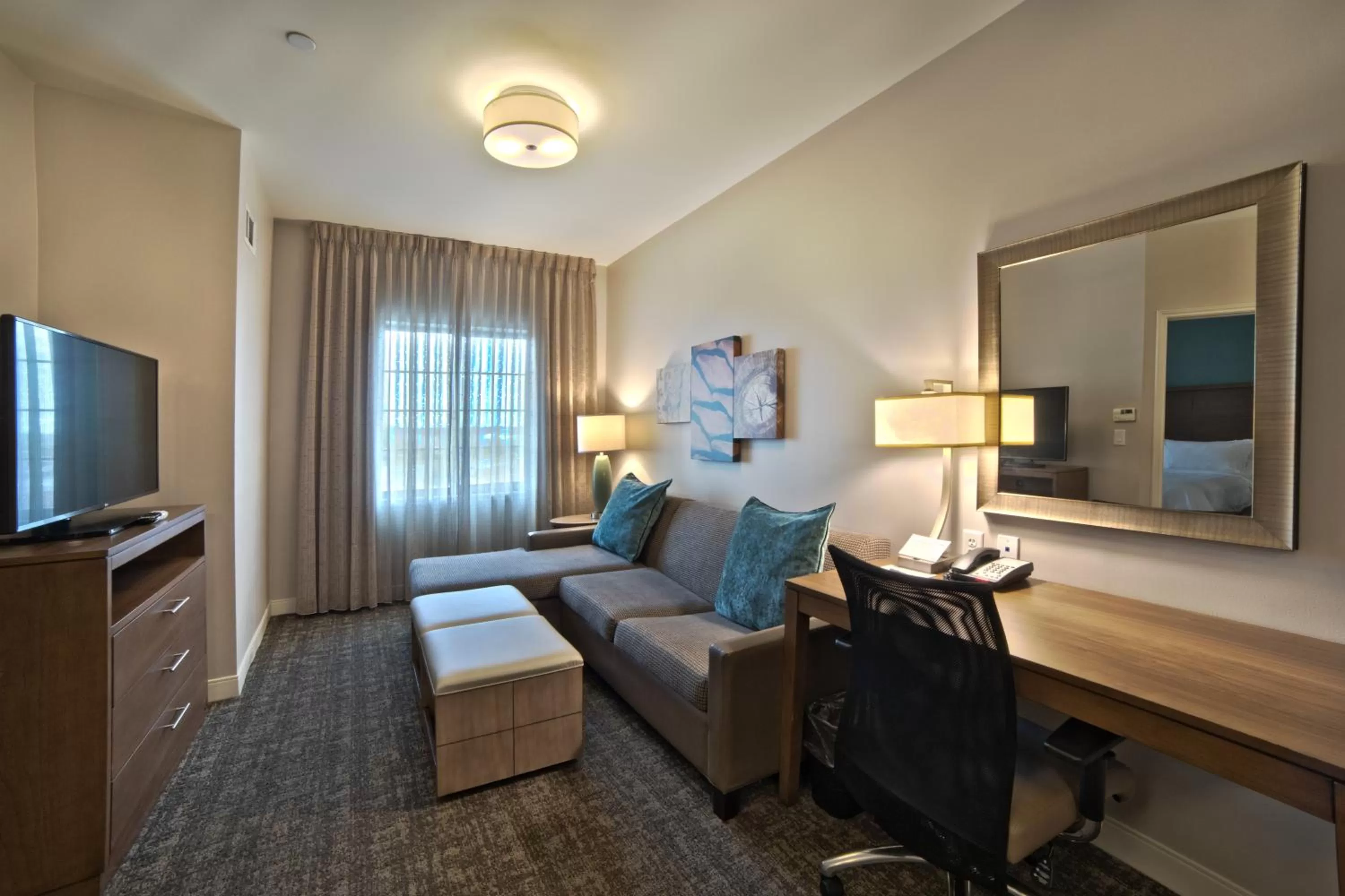 Living room, Bed in Staybridge Suites Houston - Humble Beltway 8 E by IHG