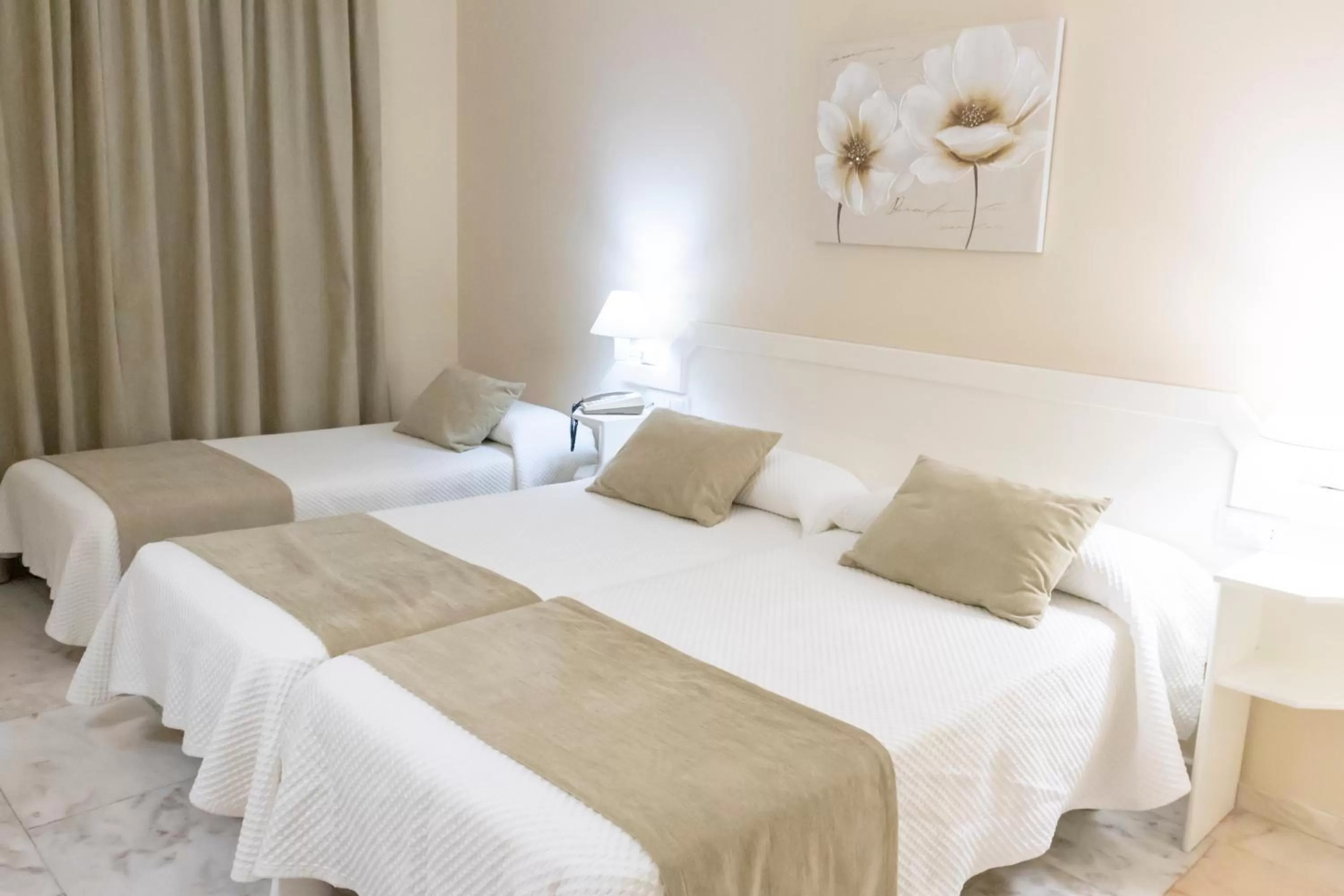 Bed in Hotel Ramomar