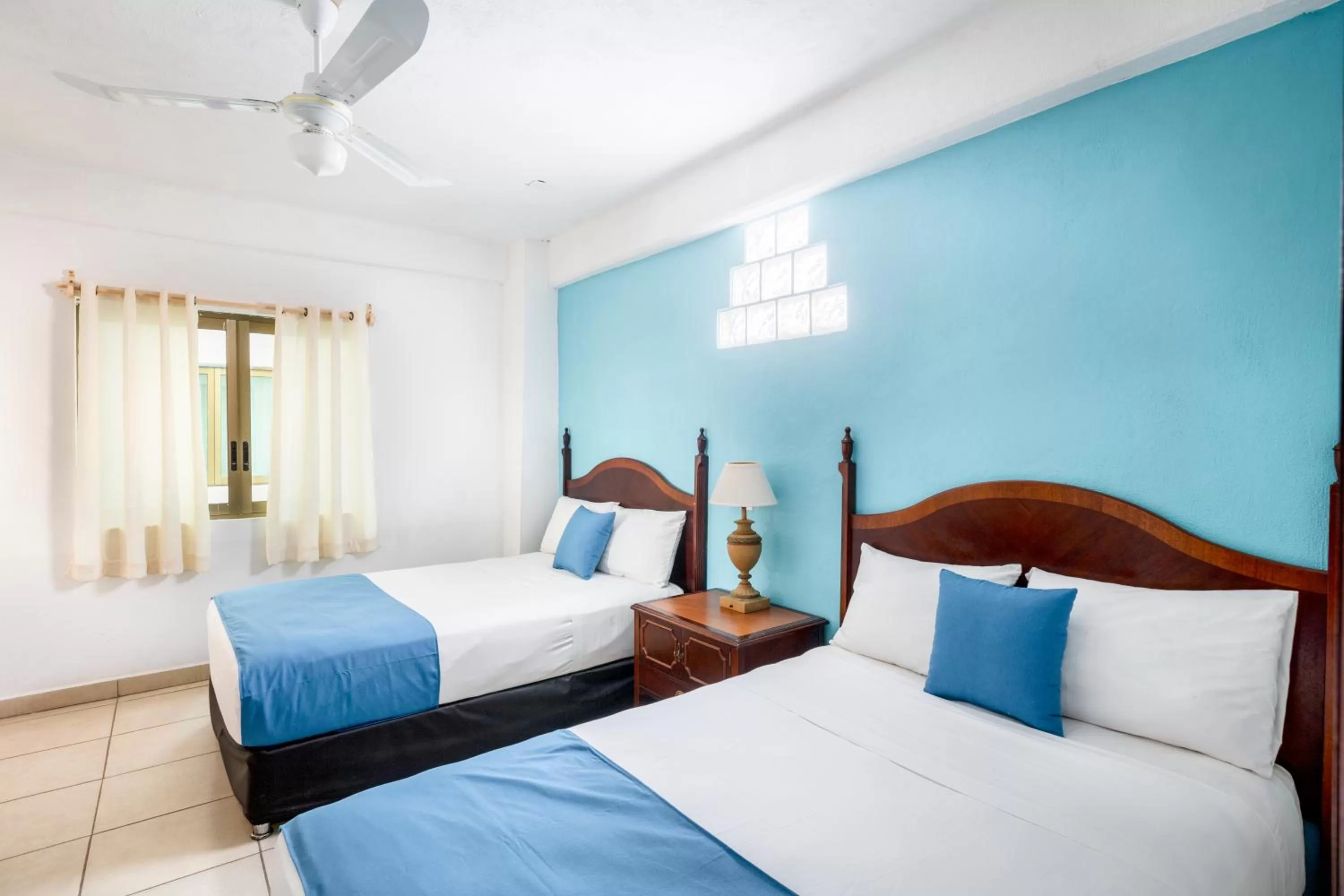 Bed in Hotel Pueblito Vallarta