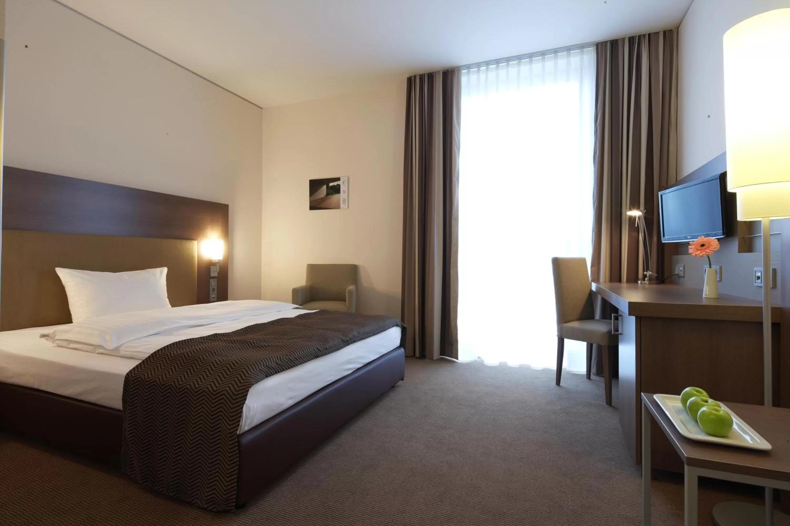 Photo of the whole room, Bed in IntercityHotel Mannheim