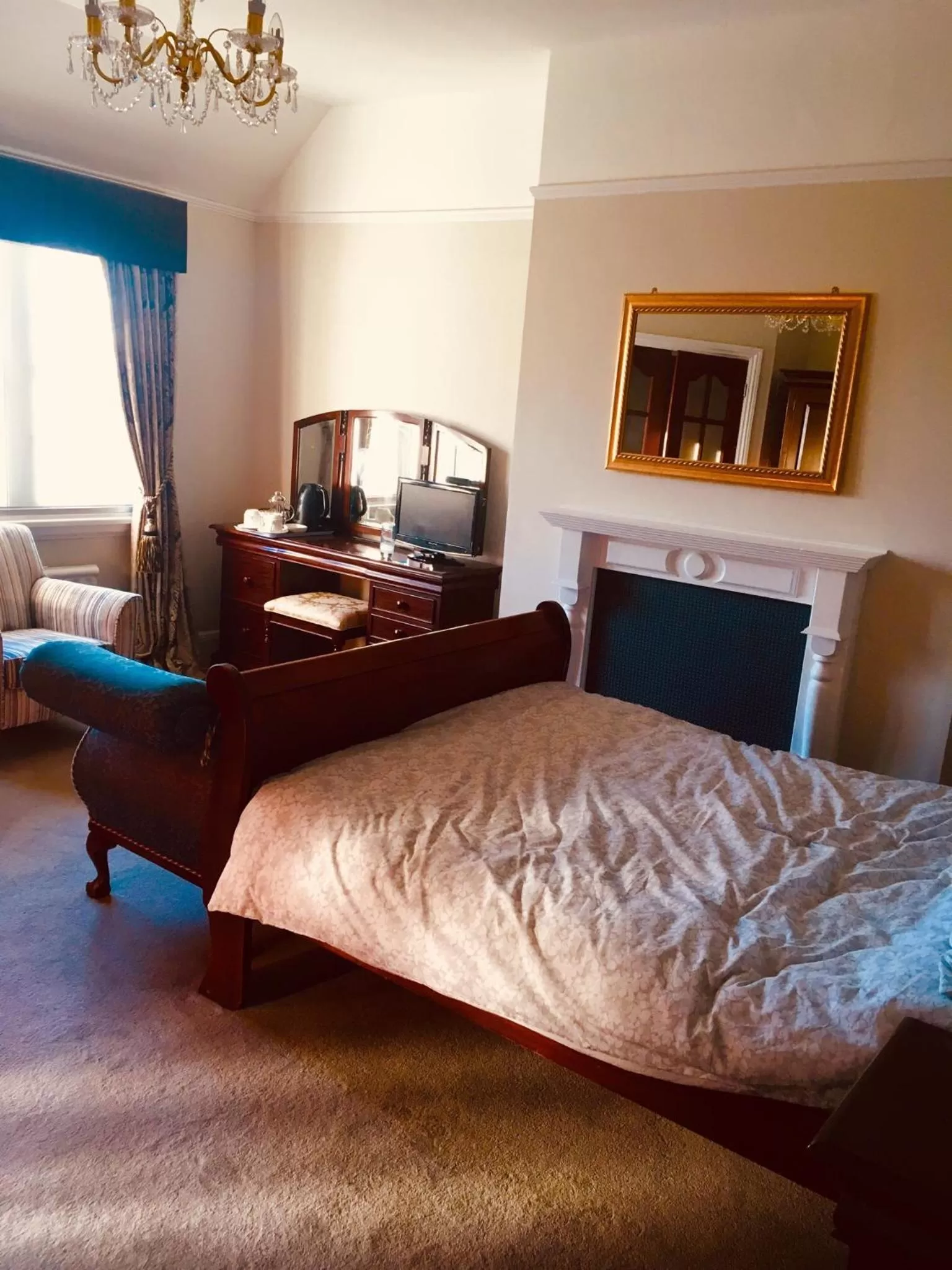 Bed in Brass Castle Country House Accommodation