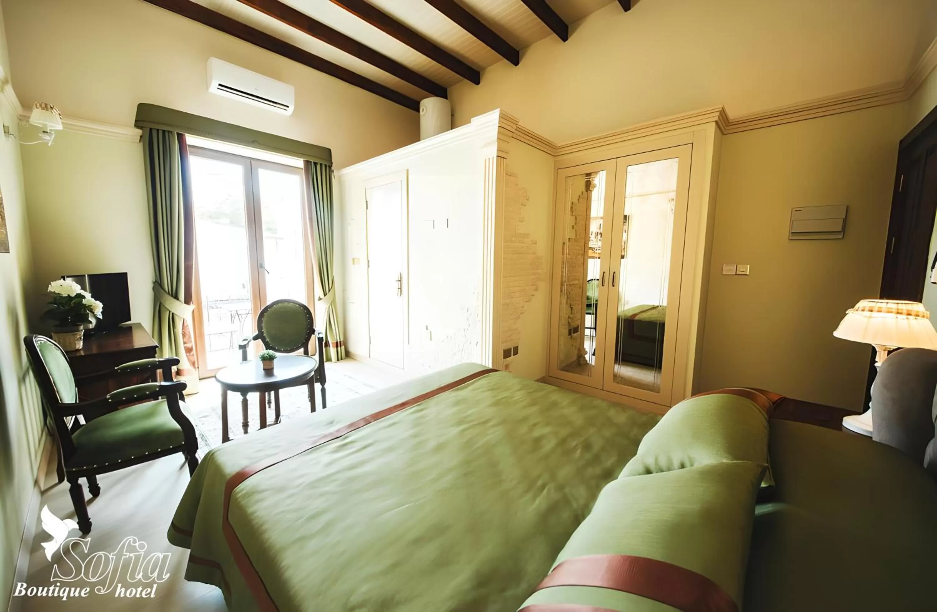 Bed in SOFIA BOUTIQUE HOTEL