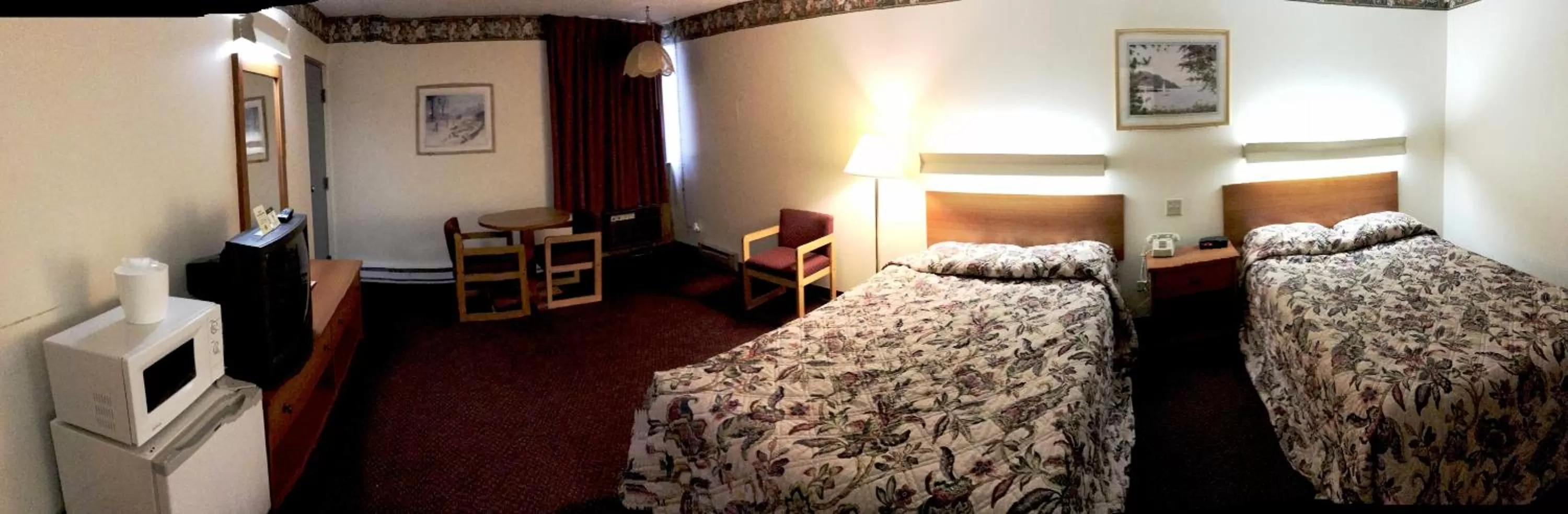 Bed in Adirondack Efficiencies