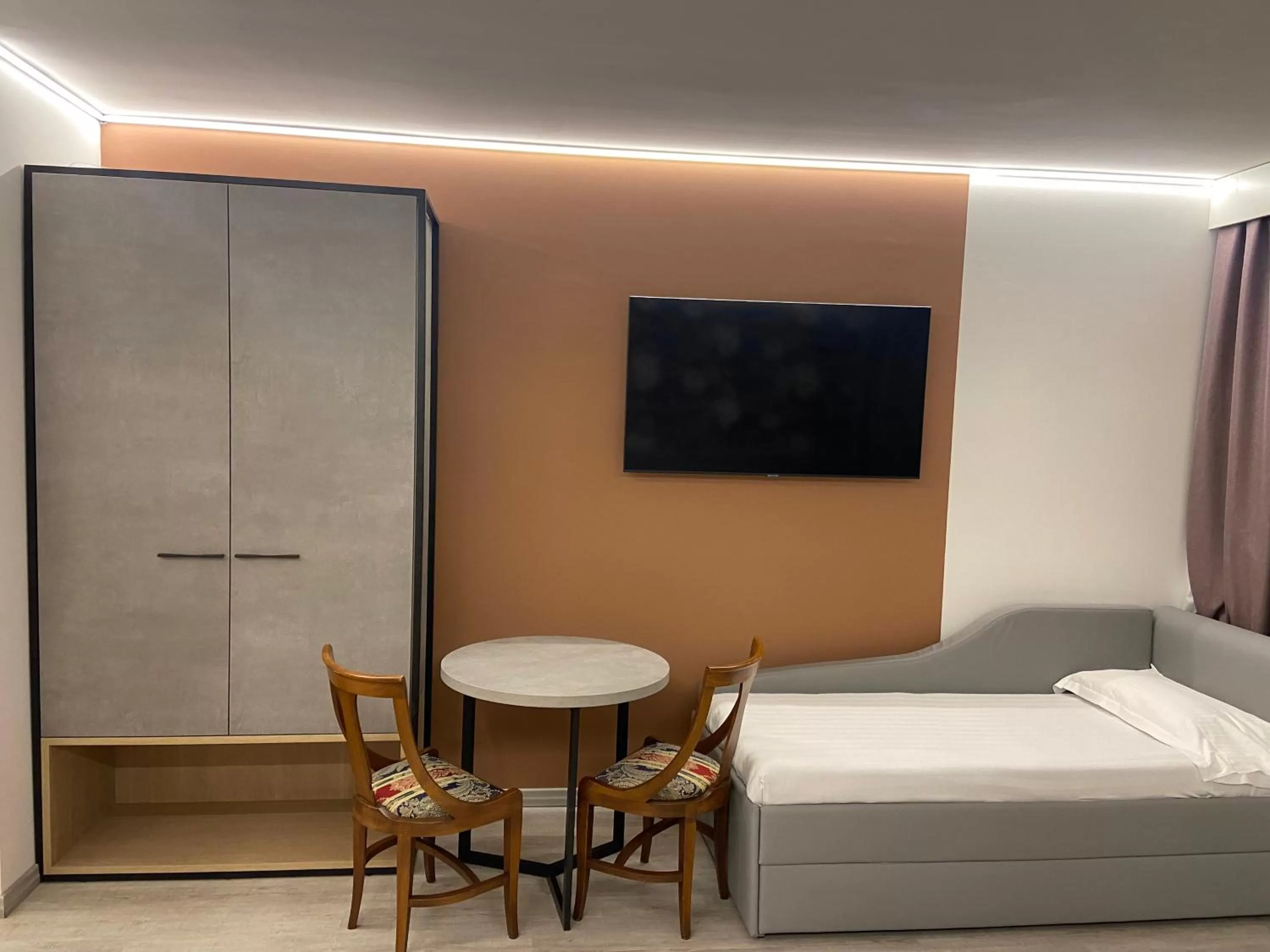 Seating area, Bed in Corte Ongaro Hotel