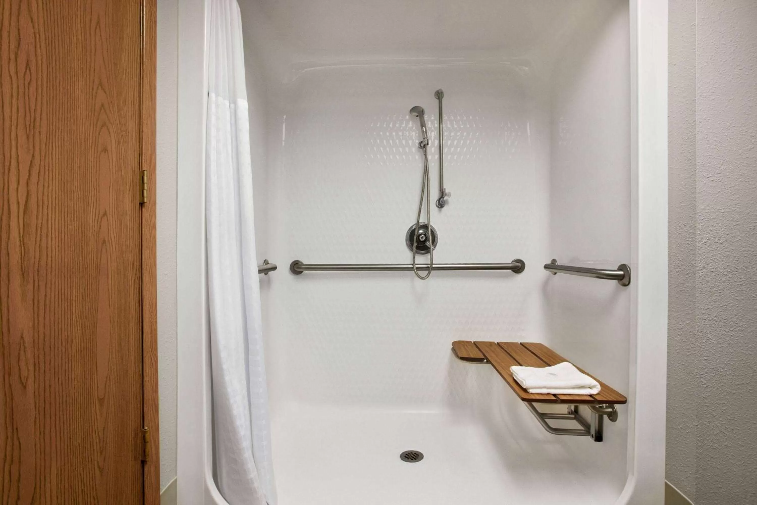 Shower in AmericInn by Wyndham Branson & Conference Center