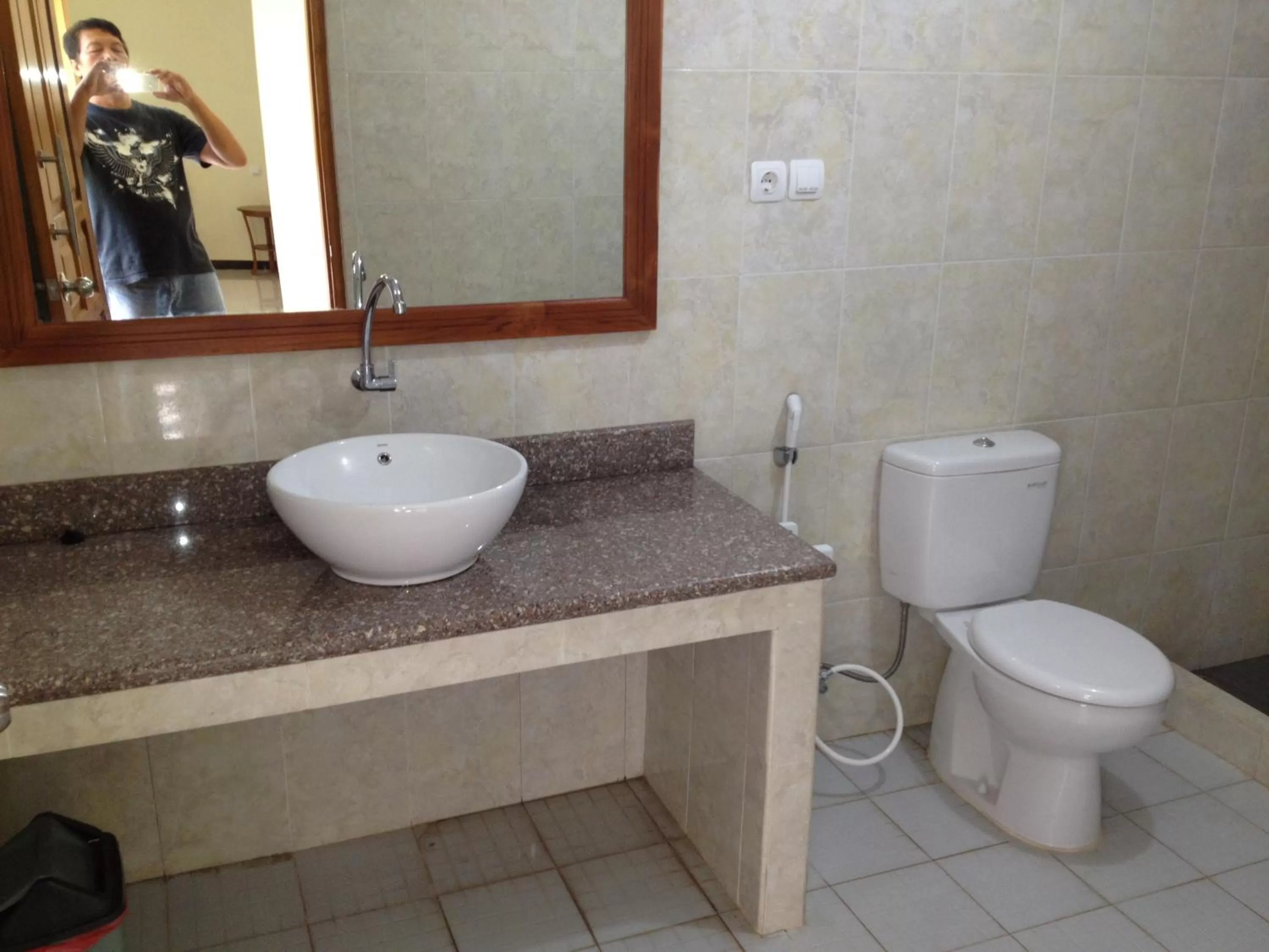 Bathroom in Astina Hotel