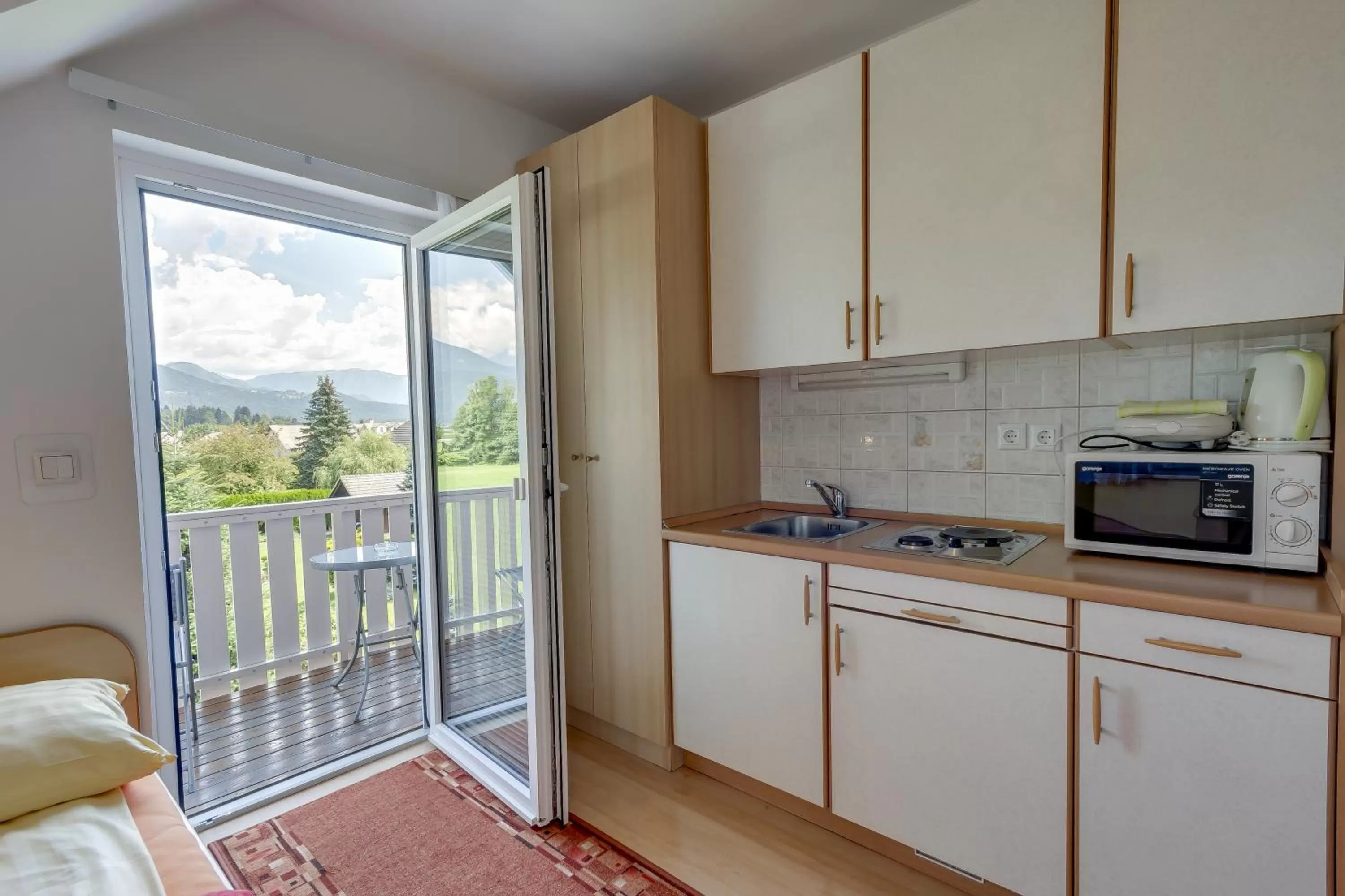 Kitchen or kitchenette in Rooms & Apartments Jana