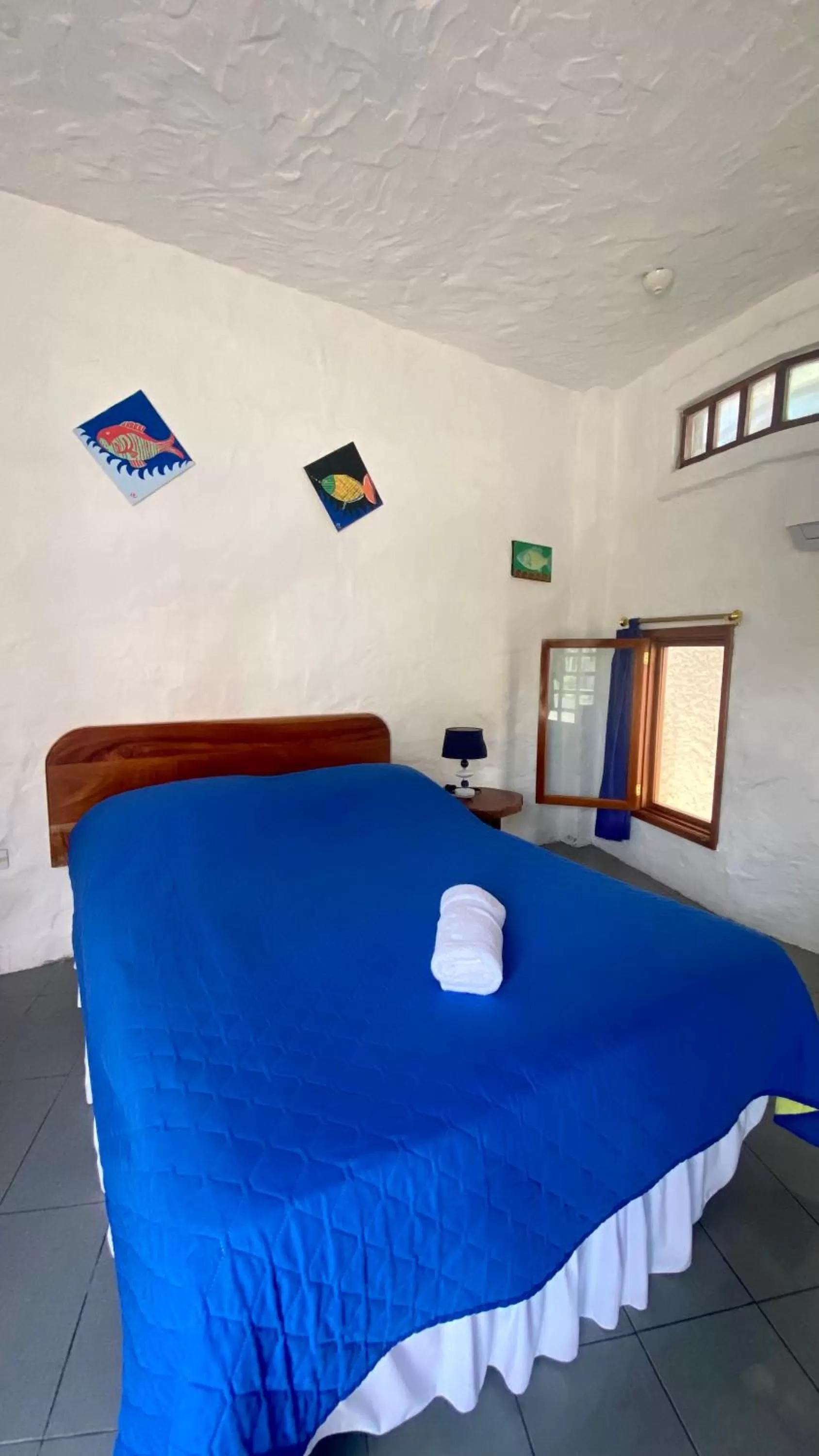 Bed in Hostal Galapagos by Bar de Beto