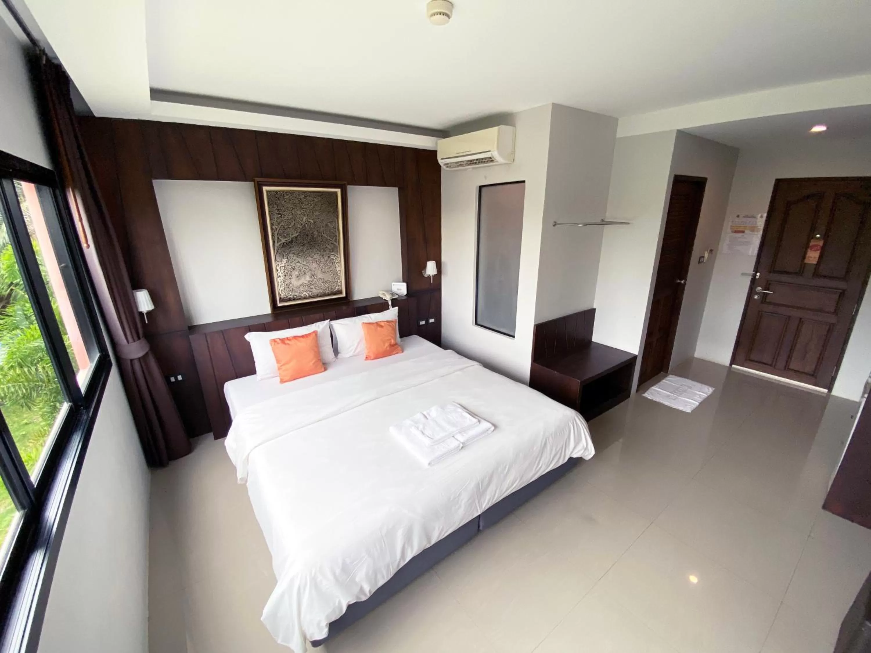 Bed in Rakkawan Residence