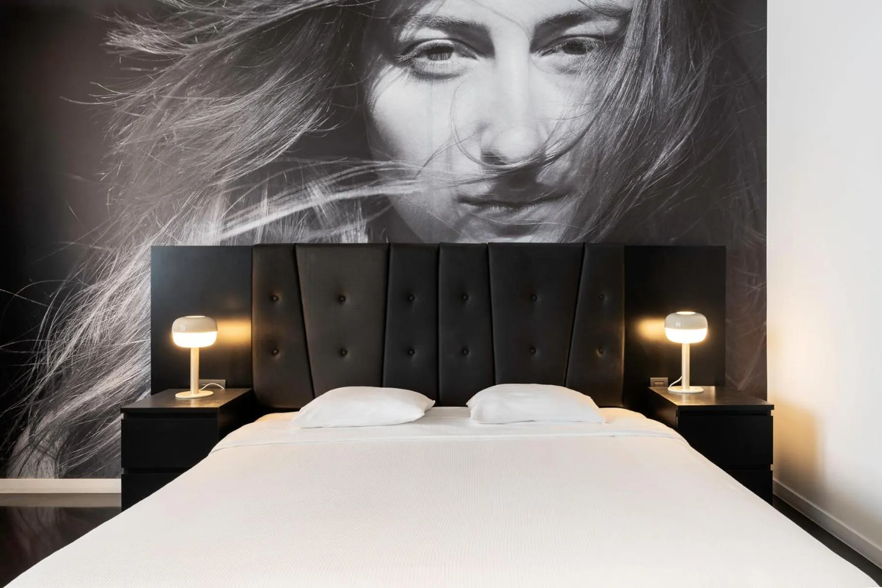 Bed in B-aparthotel Regent