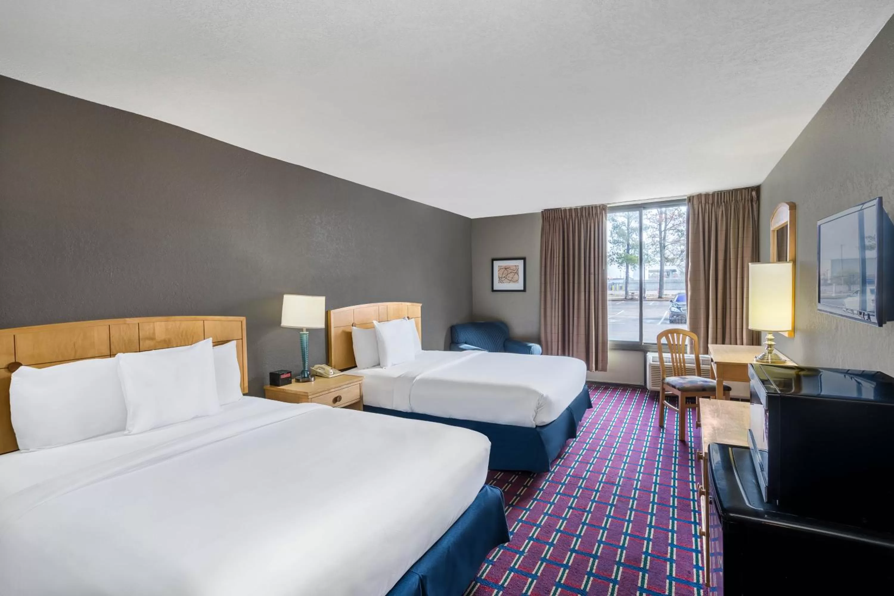 Photo of the whole room in Travelodge by Wyndham Memphis Airport/Graceland