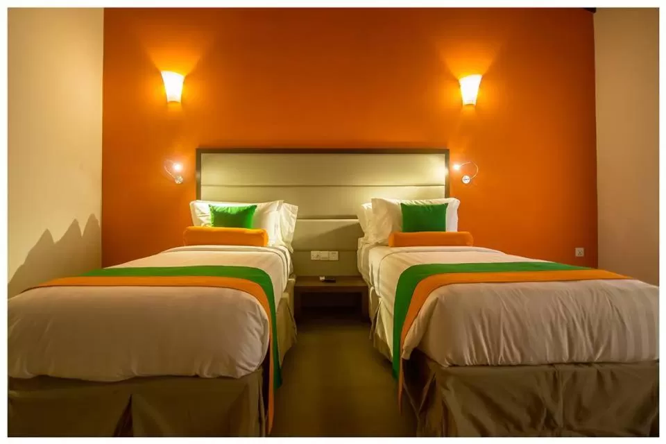 Bed in The Thinnai - All-Suites Boutique Hotel