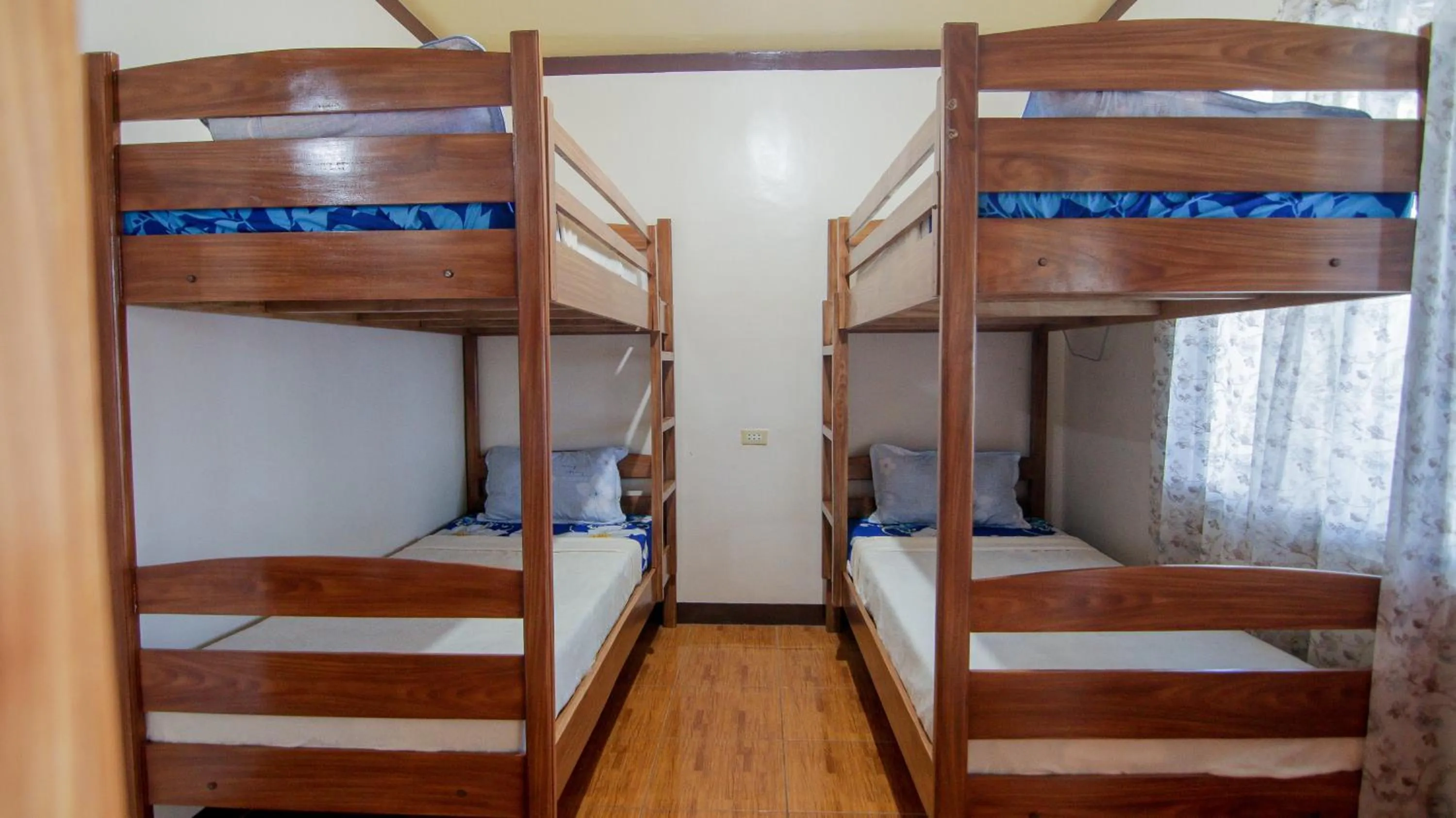 Bed in Gratum Beach Resort