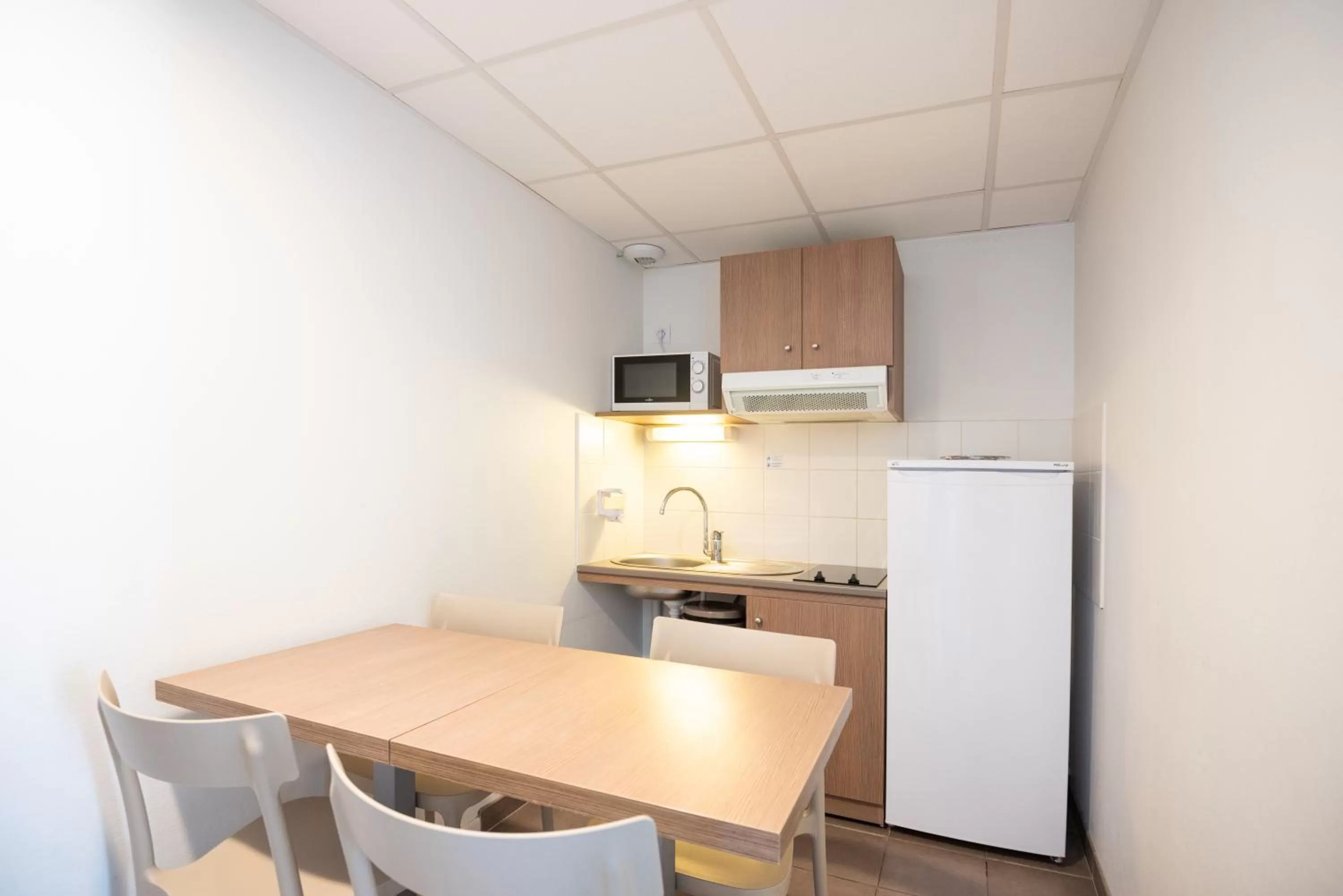 Kitchen or kitchenette in Zenitude Hôtel-Résidences Narbonne Centre