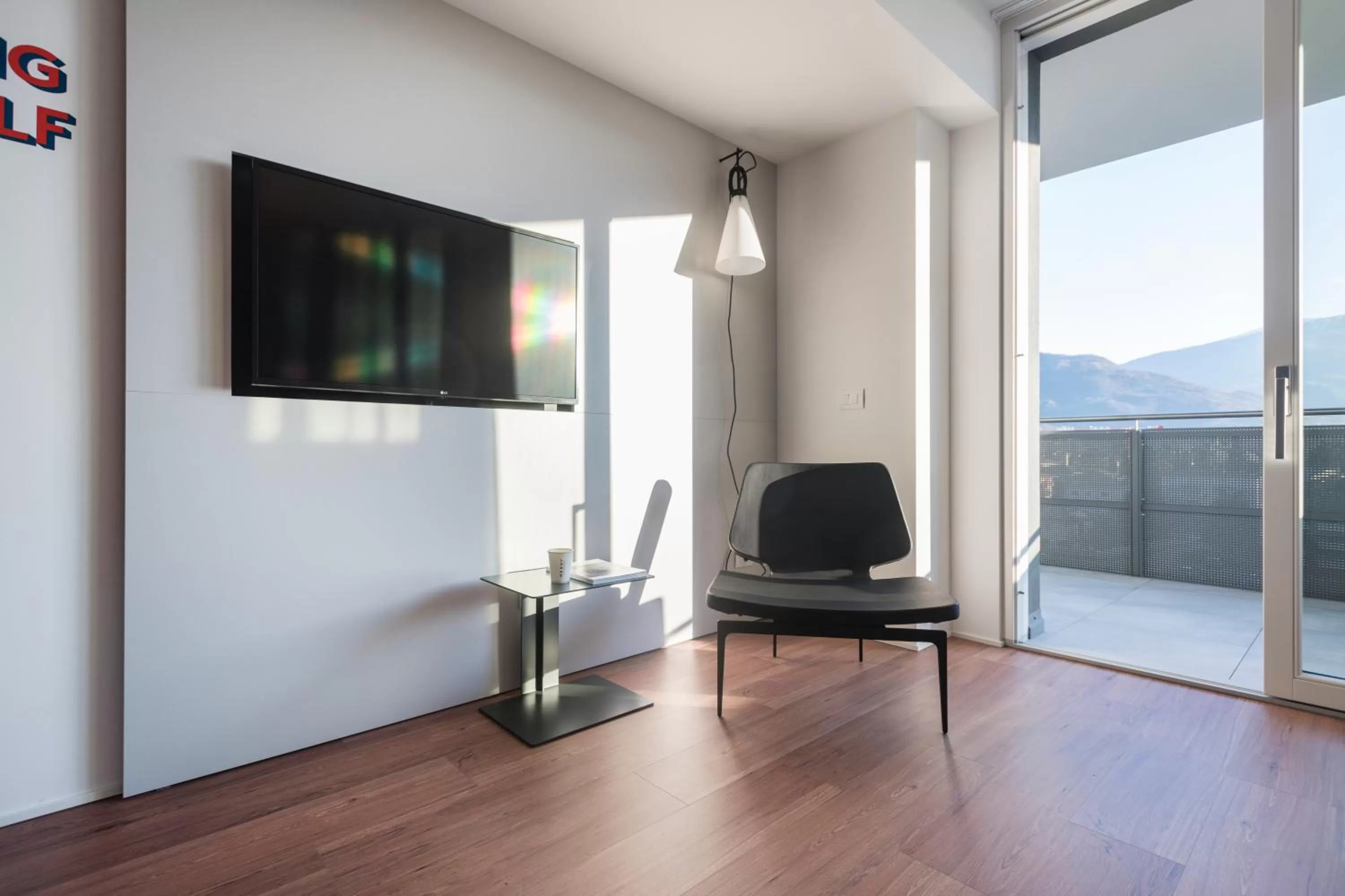 Communal lounge/ TV room in HOODY ACTIVE & HAPPINESS HOTEL