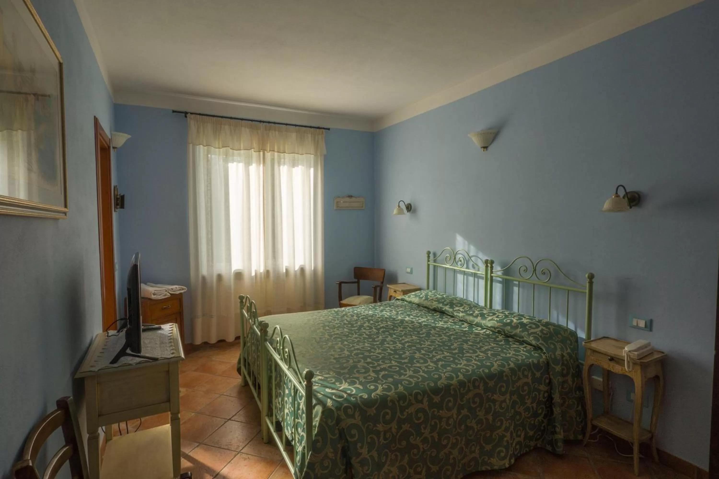 Bed in Albergo Il Sicomoro