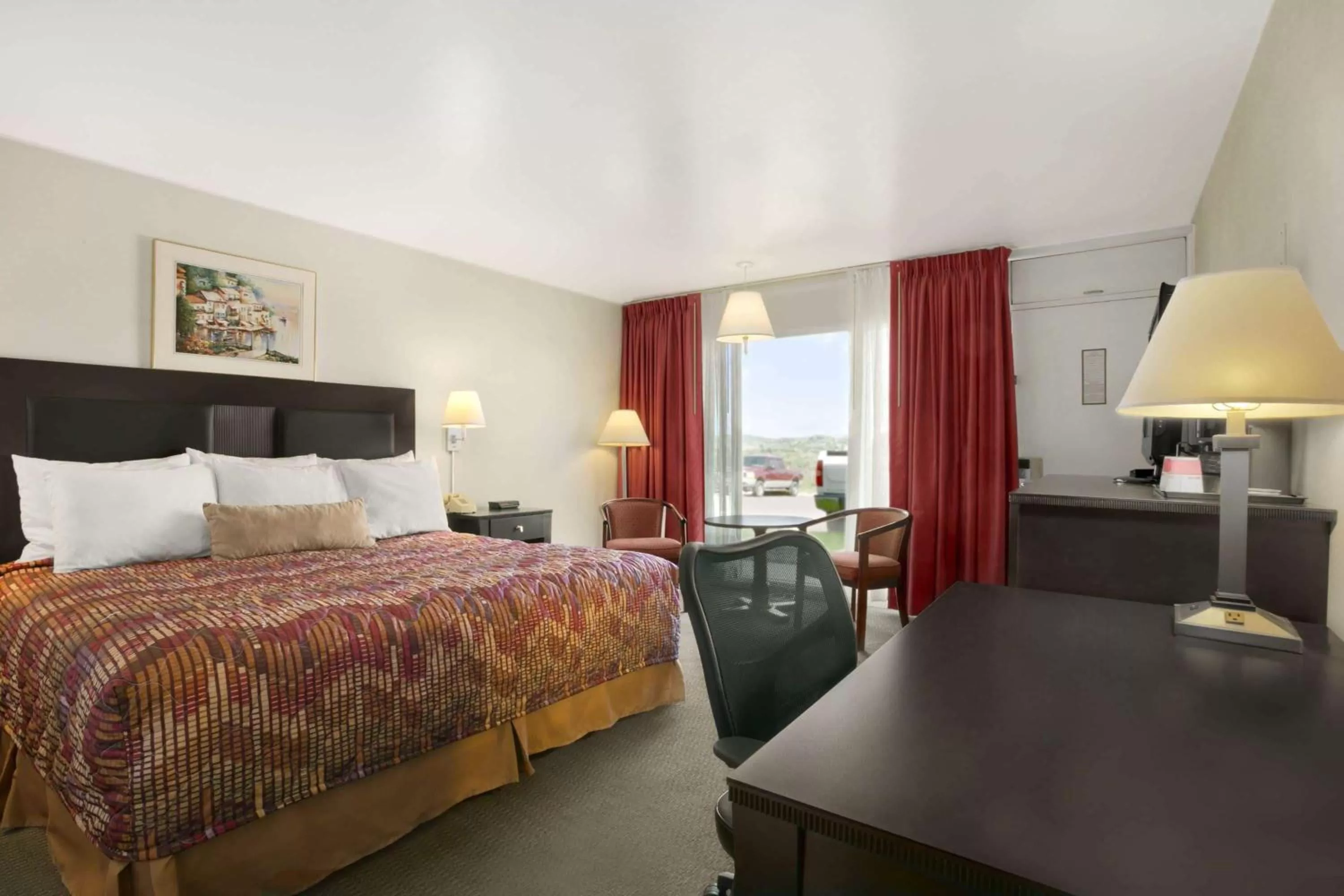 Photo of the whole room, Bed in Ramada by Wyndham Washington