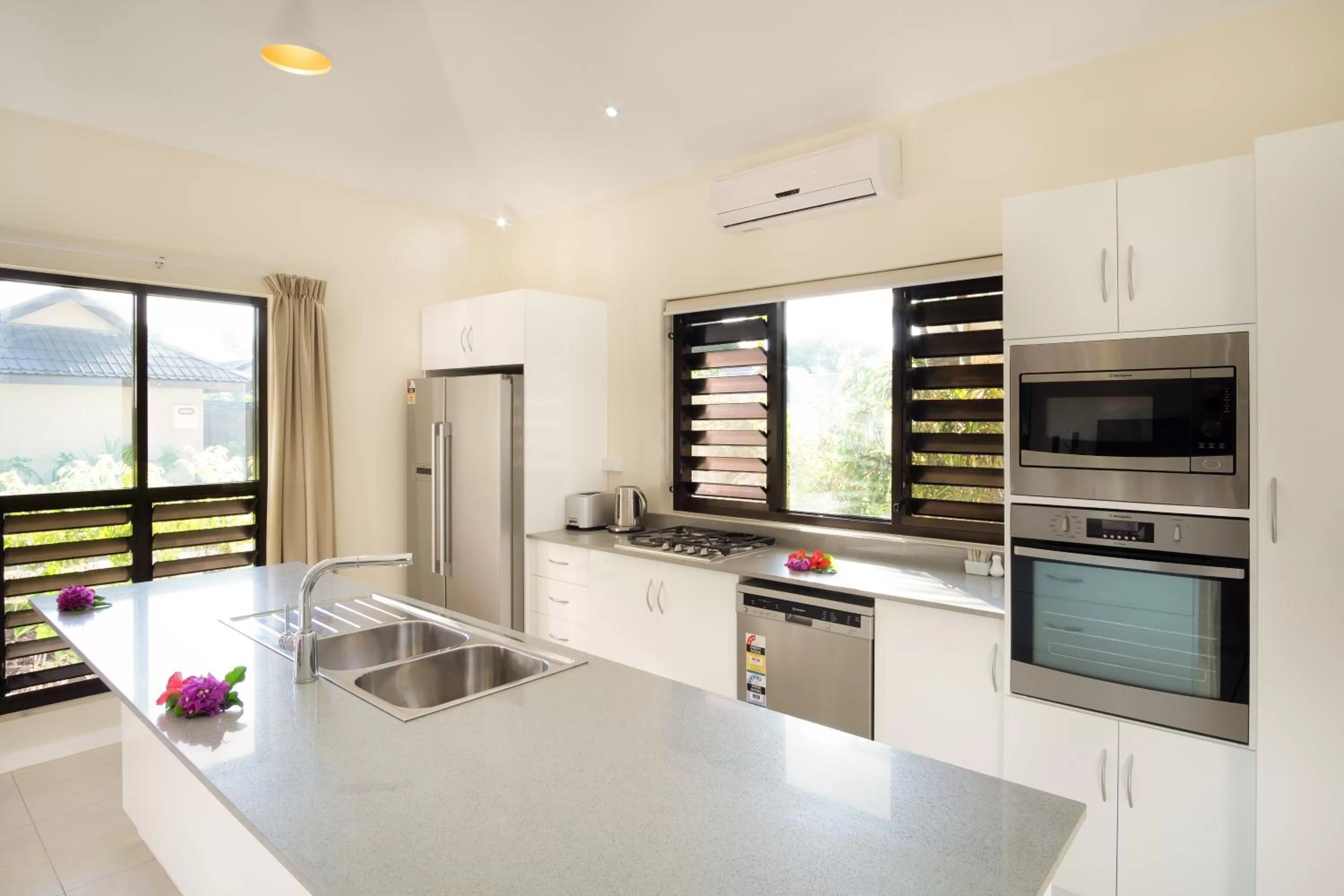 Kitchen or kitchenette in First Landing Beach Resort & Villas