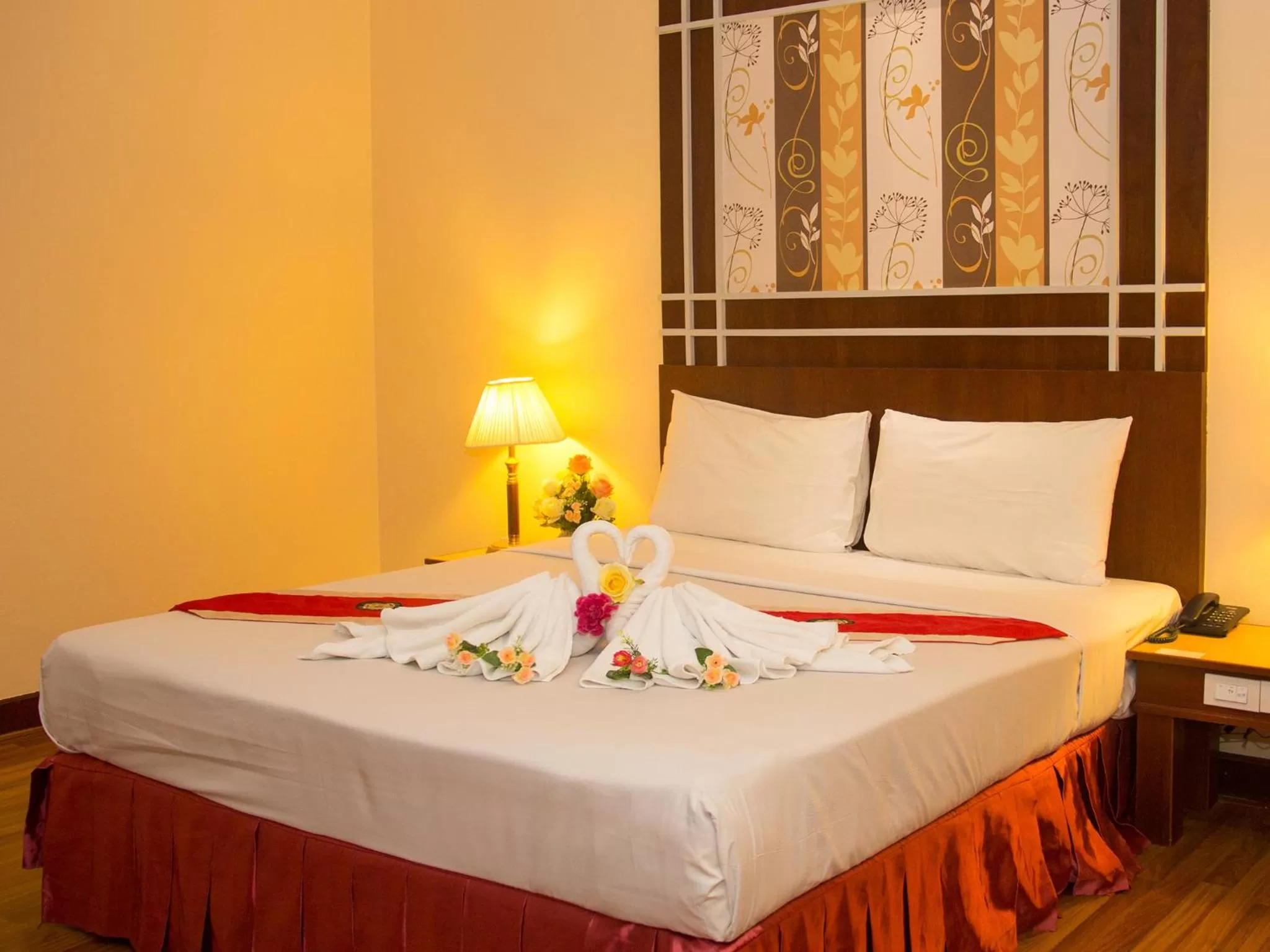 Bed in Friendlytel Hotel