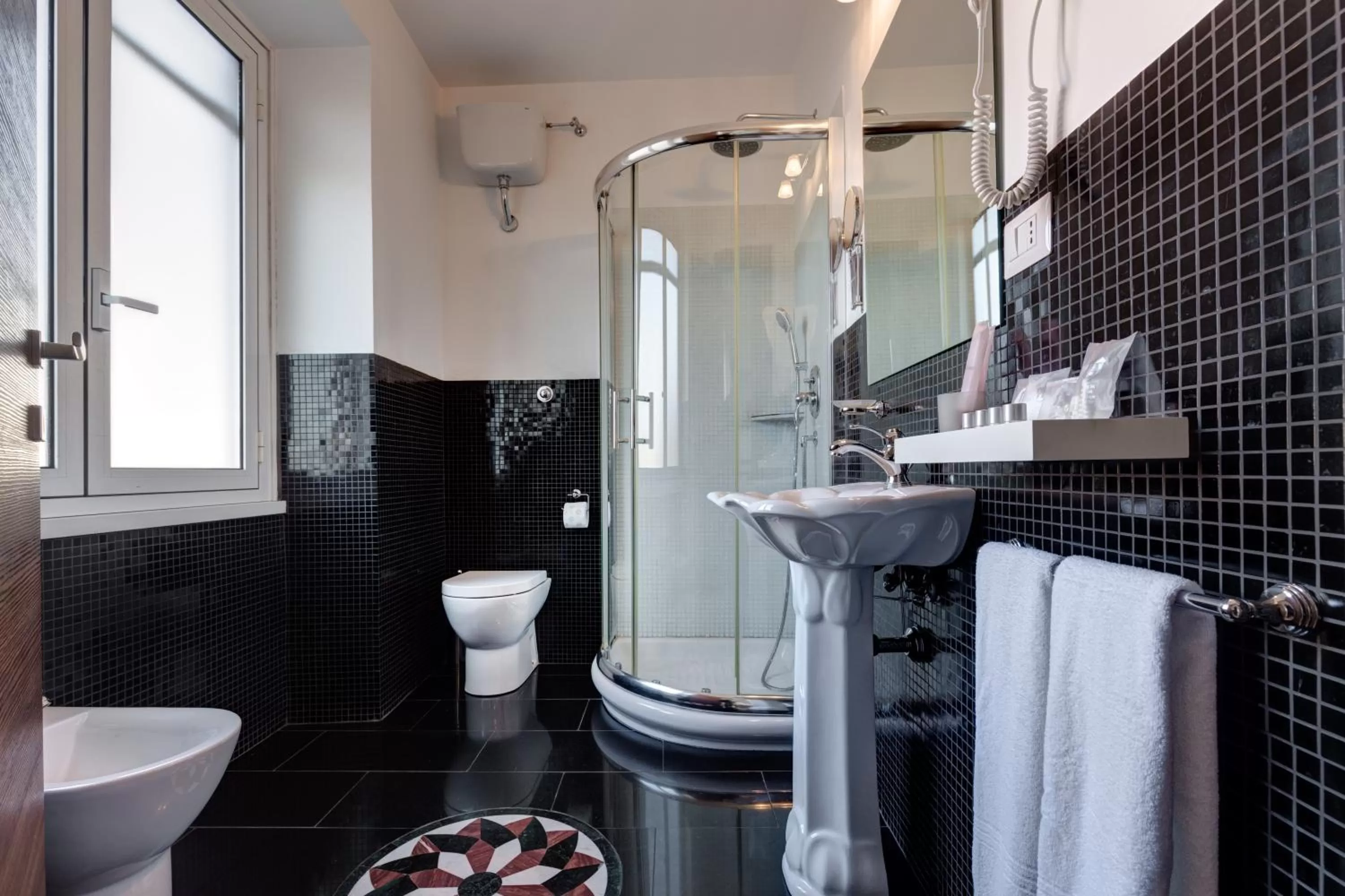 Shower in Little Rhome Suites