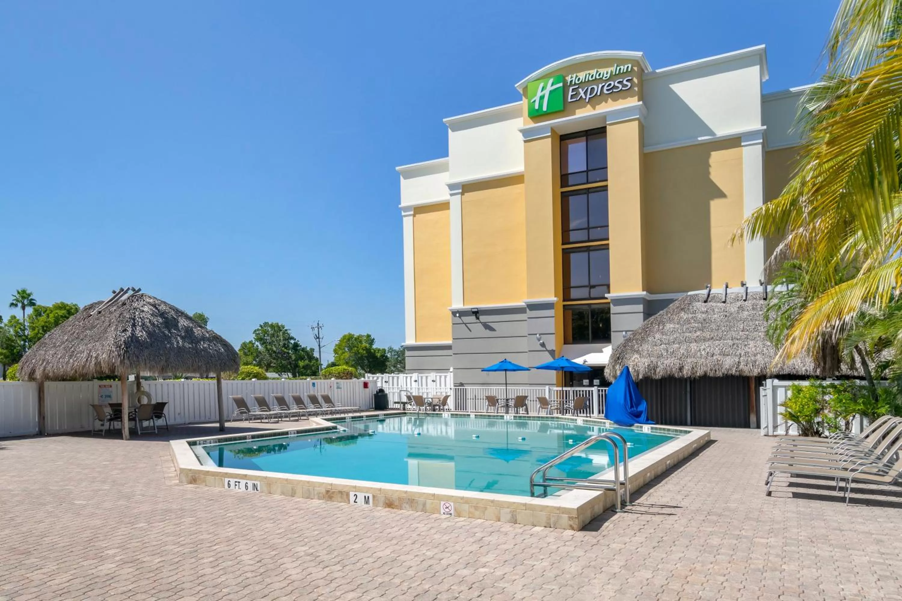 Swimming pool in Holiday Inn Express Cape Coral-Fort Myers Area by IHG